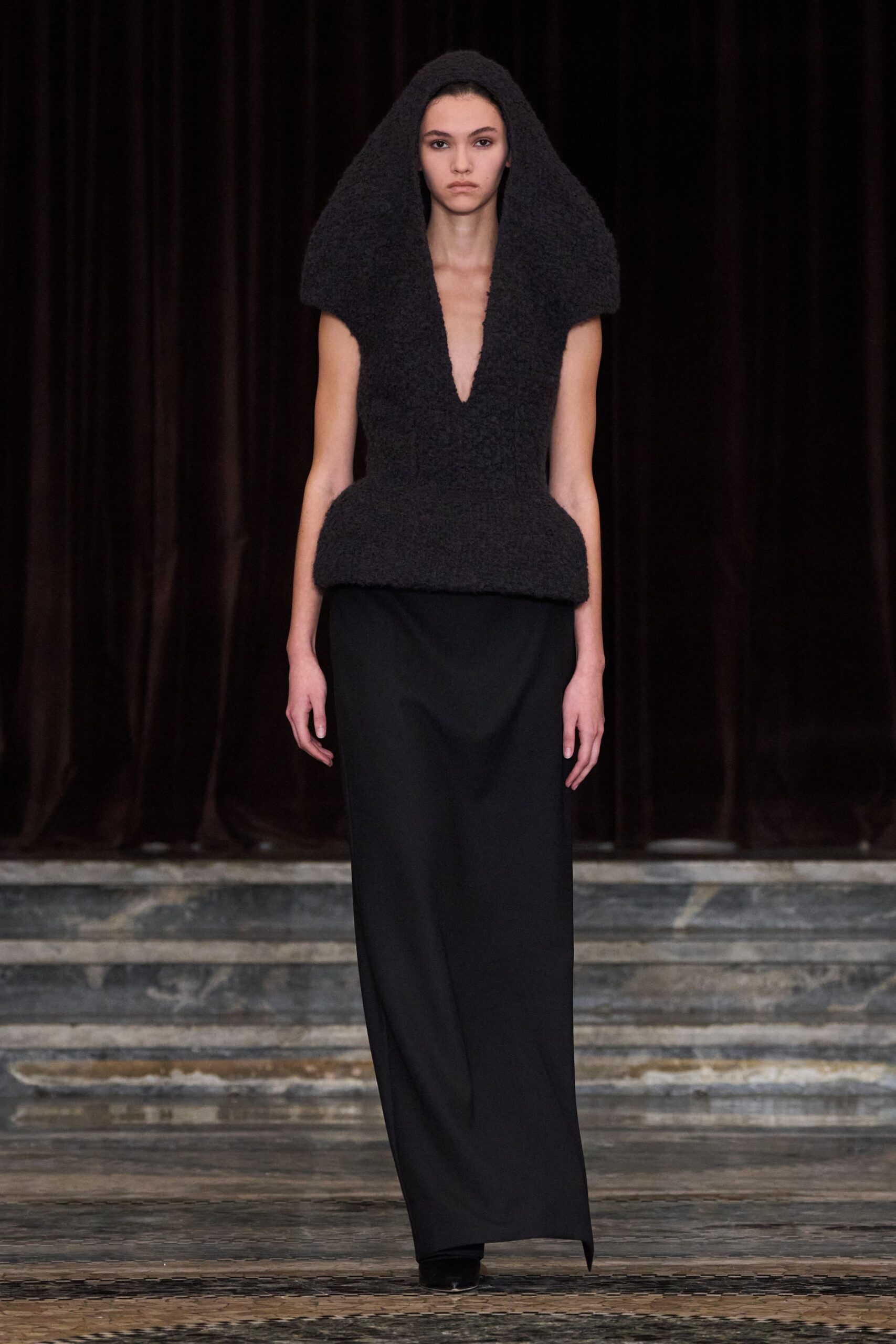 black wool gown with hooded cape