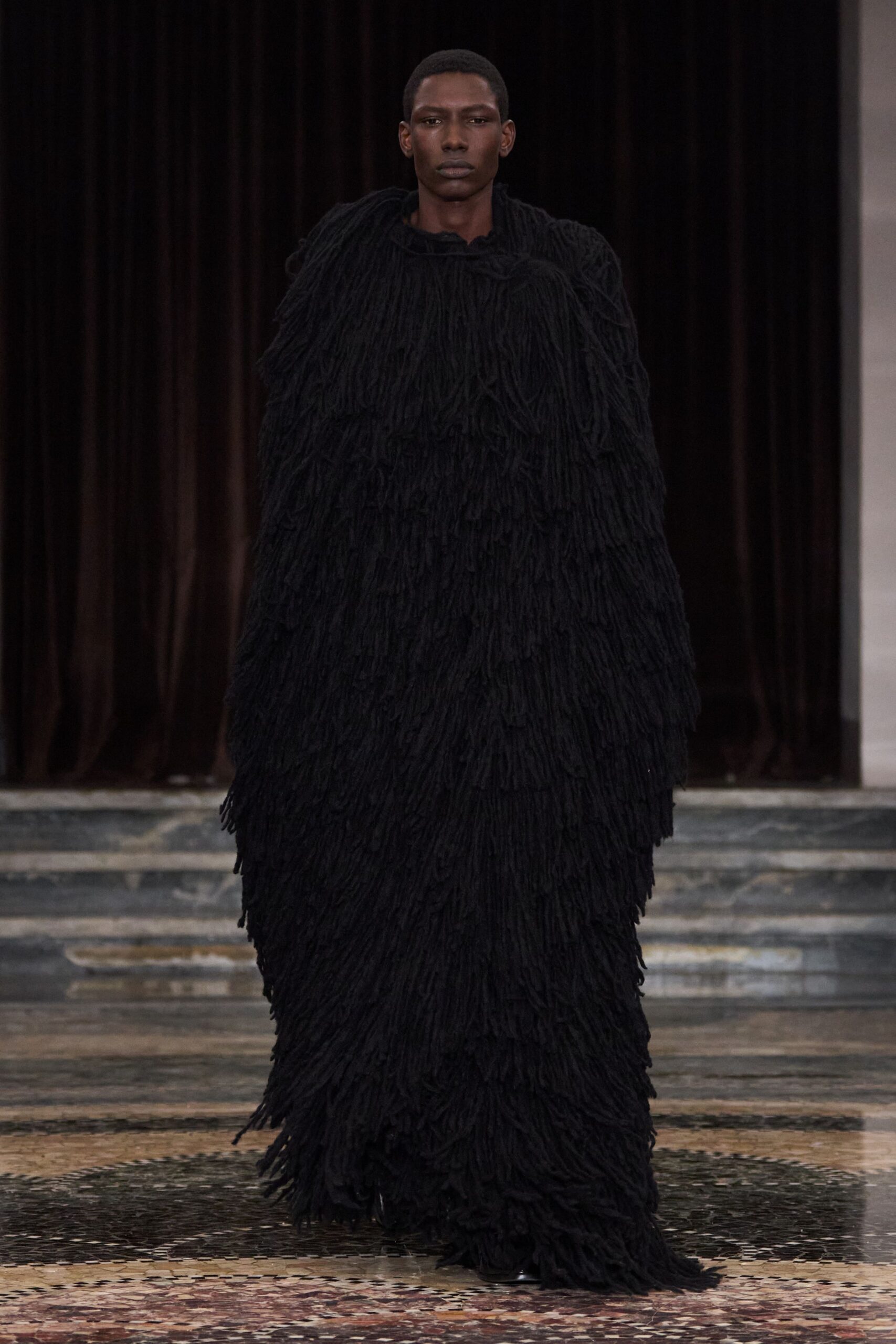 black fringed wool cape