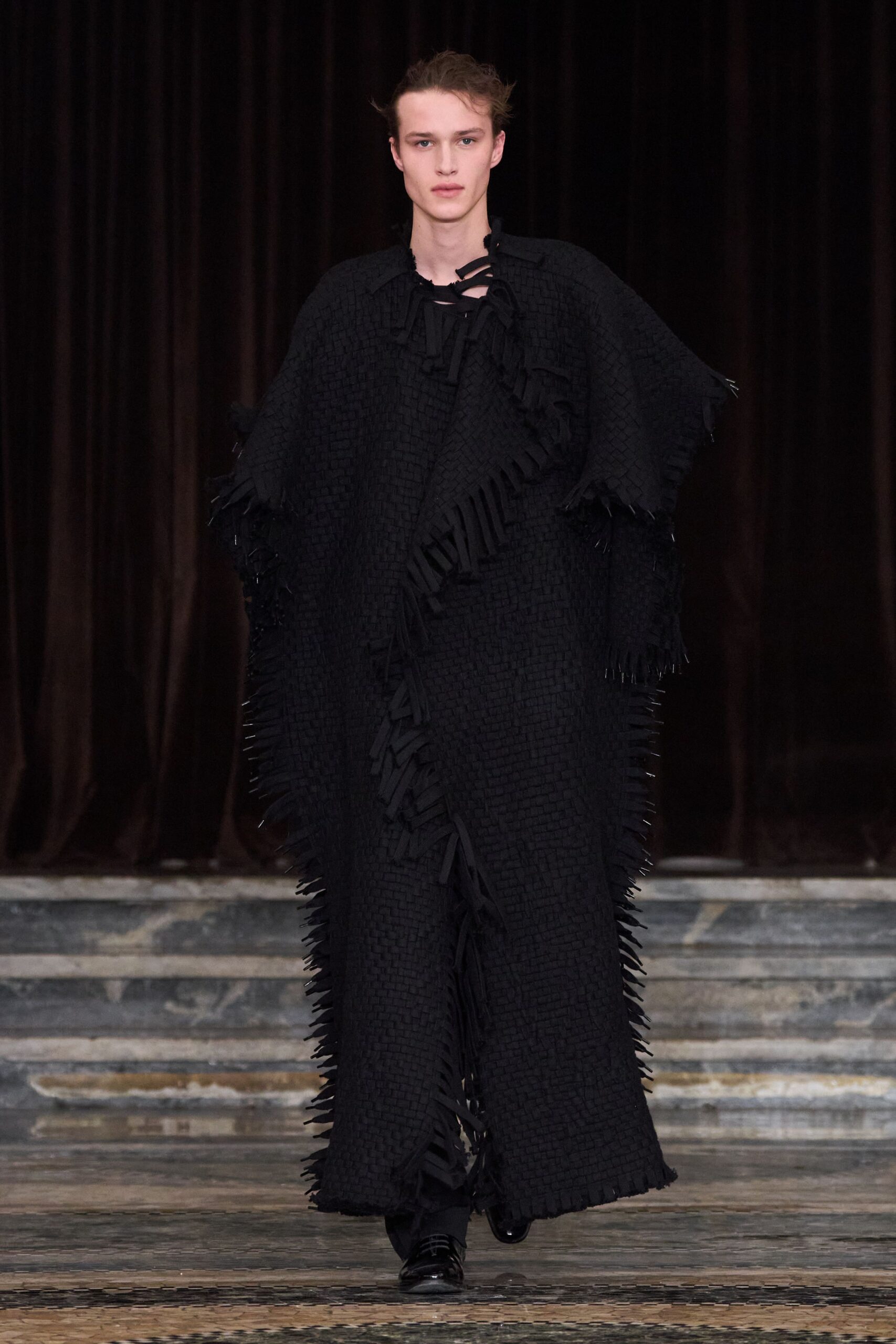 black fringed wool cape