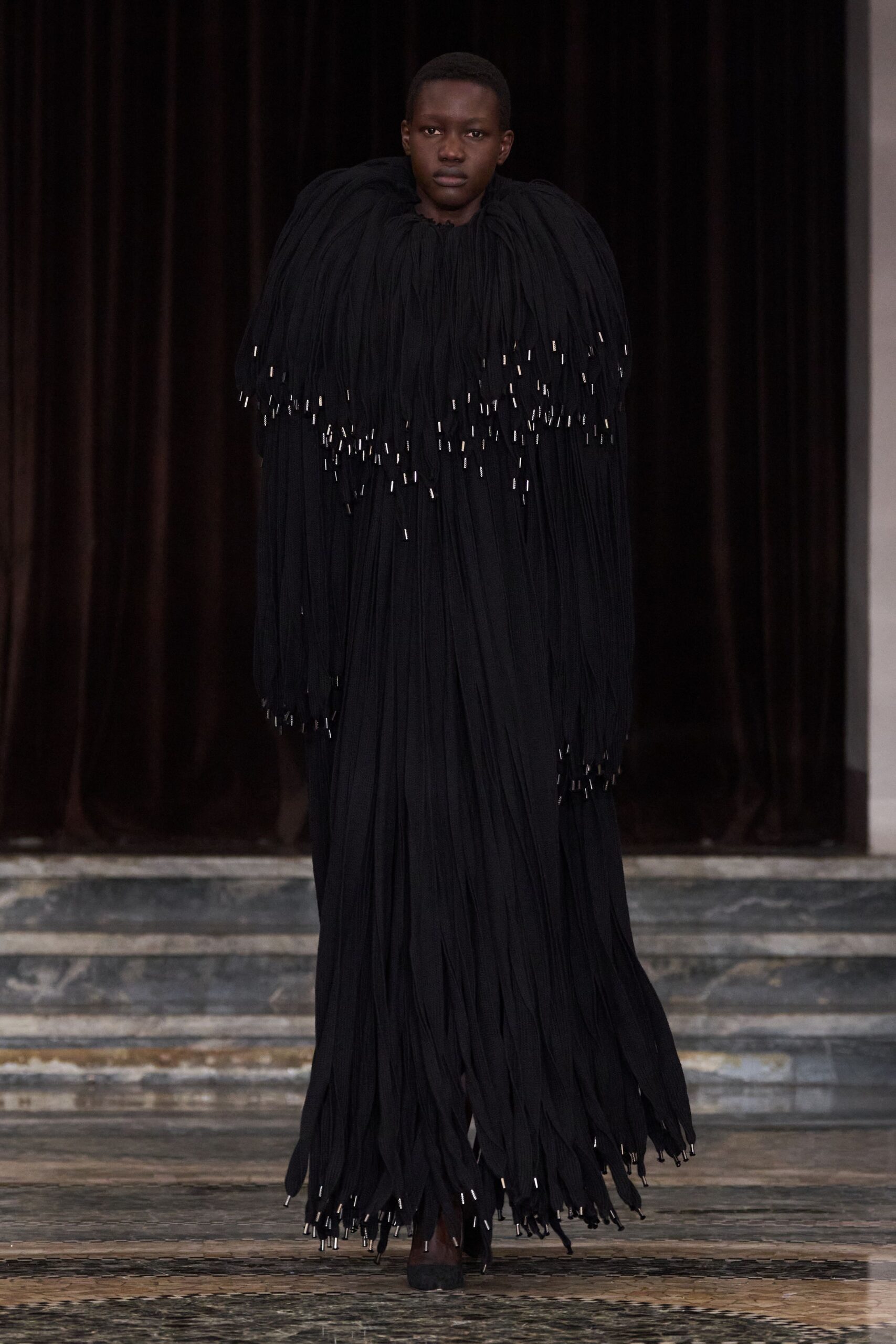 black fringed maxi gown