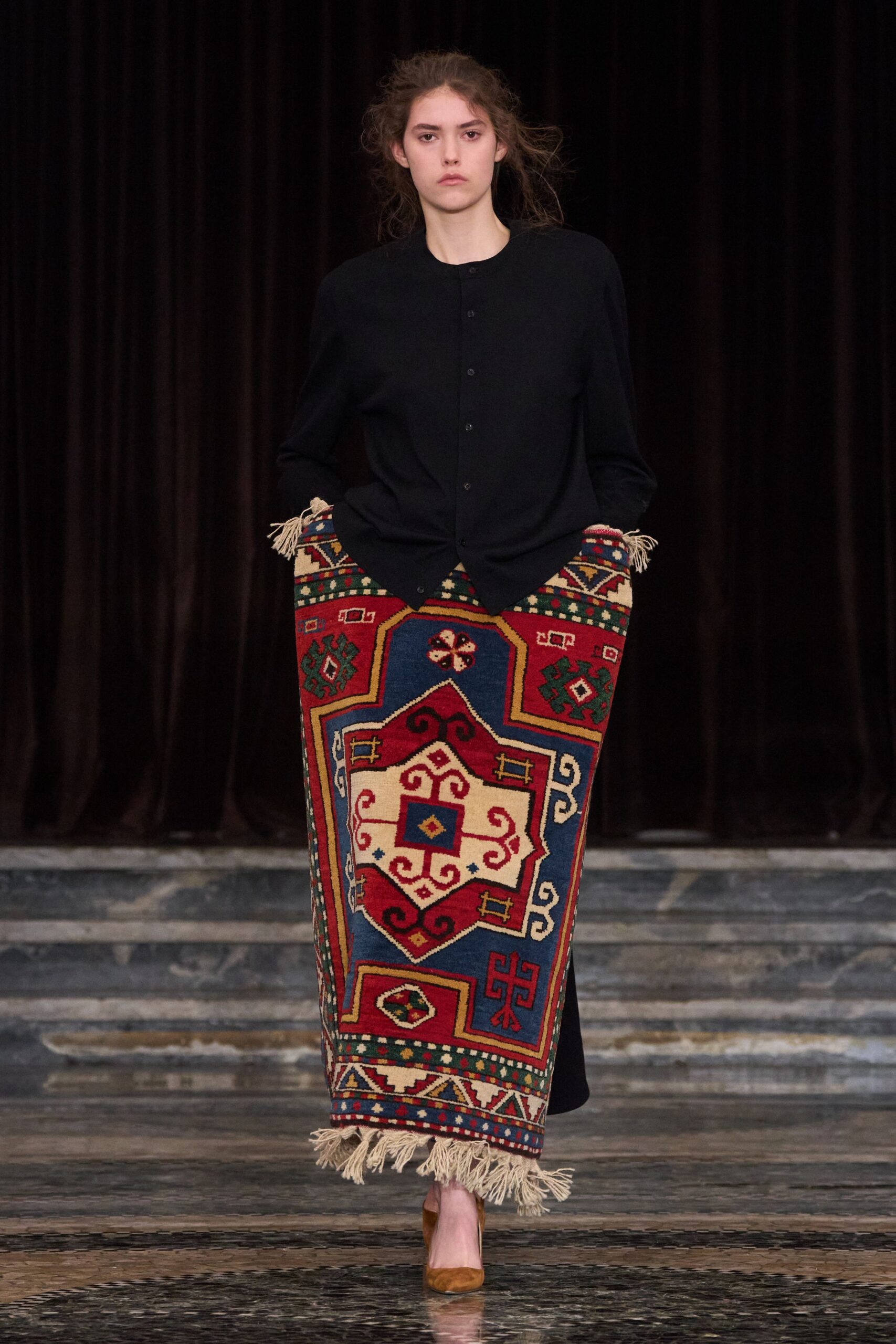 black shirt and patterned skirt