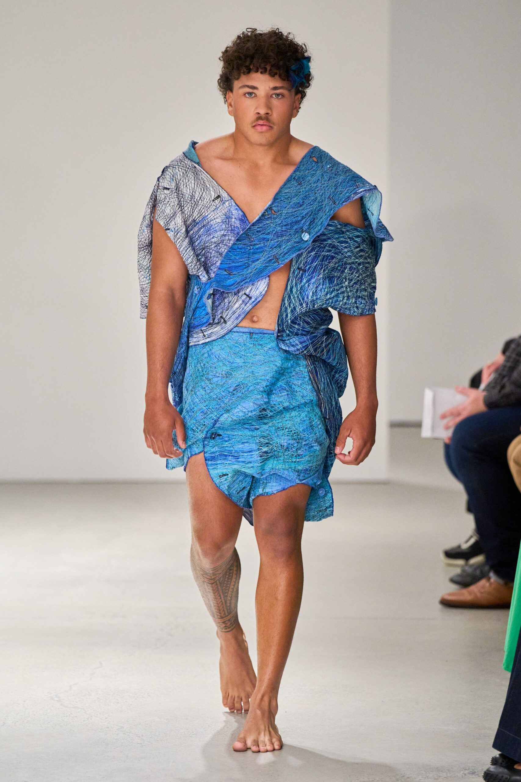 blue cotton asymmetric fitted draped mini skirt