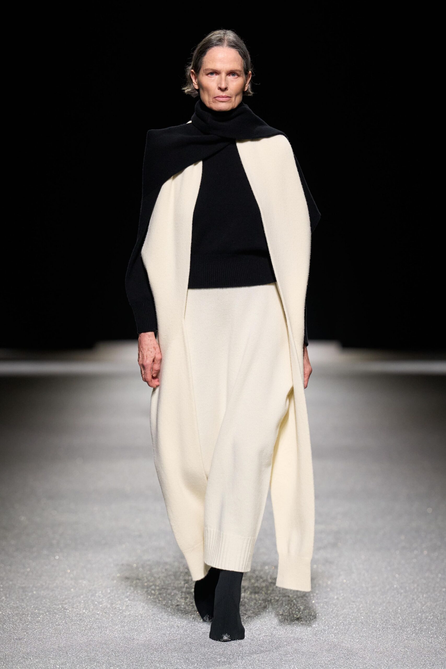 black and white wool cape and sweater