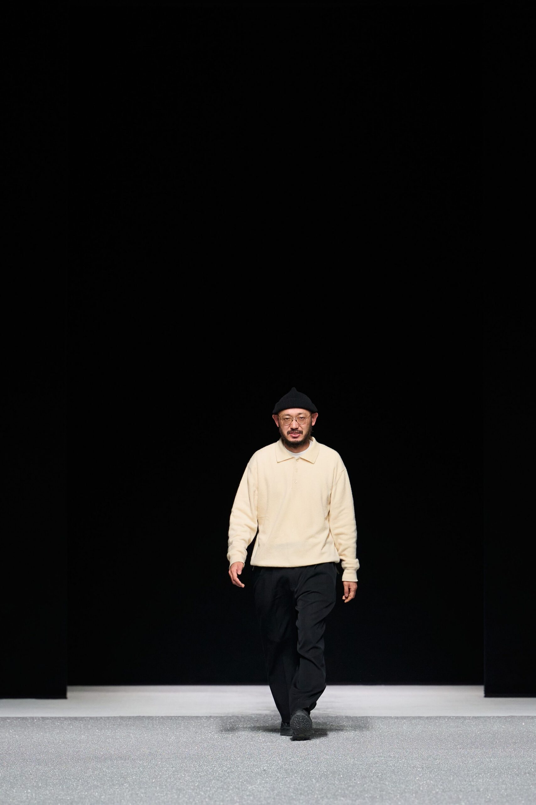 beige sweater black pants