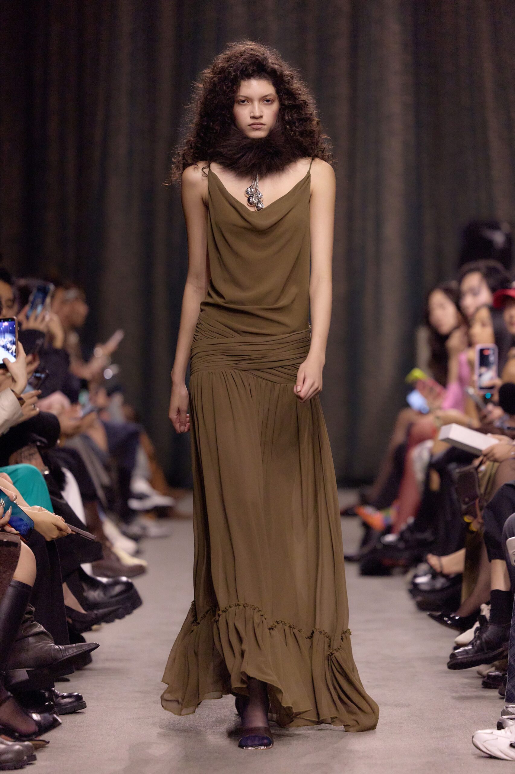 green silk sleeveless v-neck fitted draped tiered gown