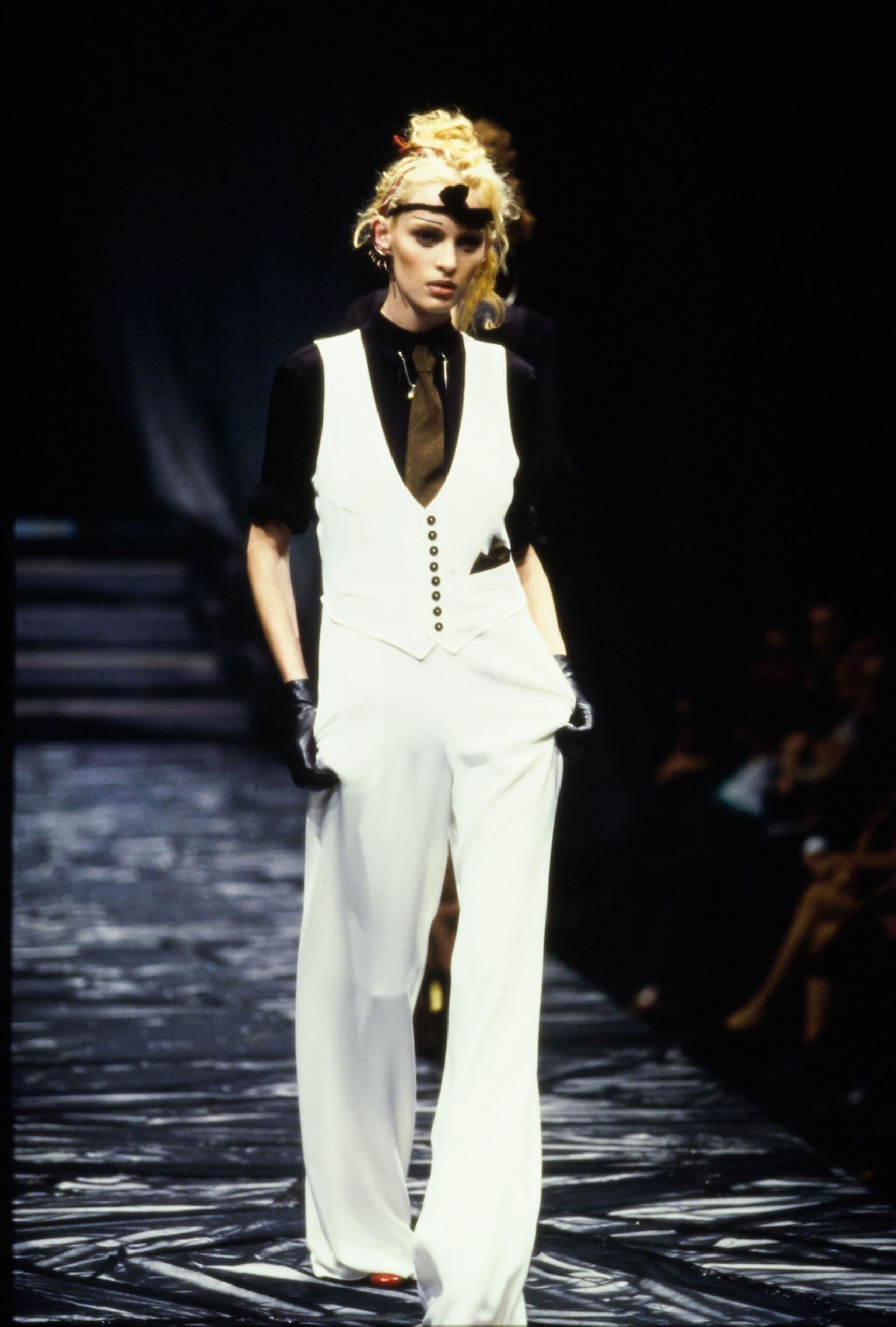 white vest black shirt wide-leg pants