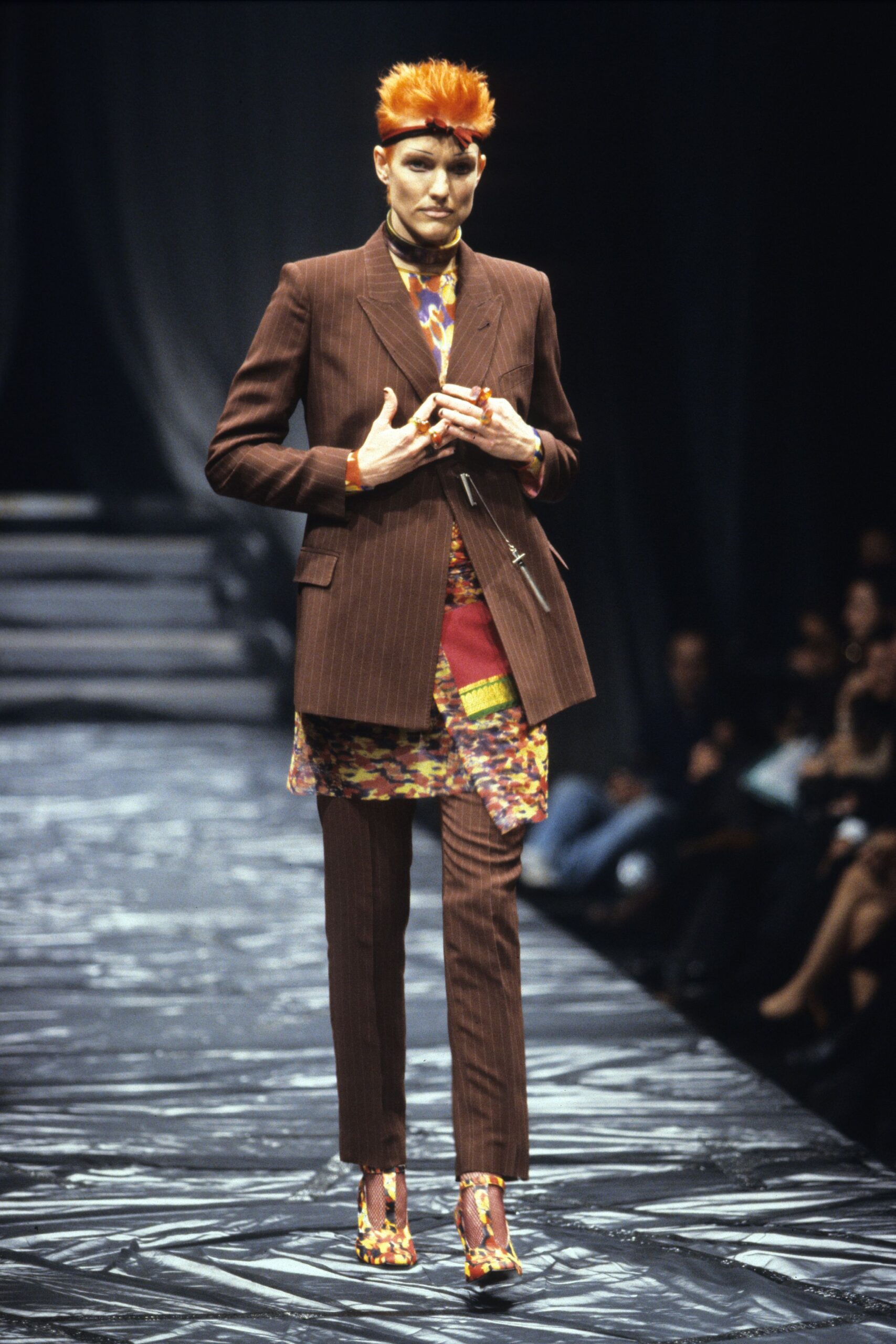 brown tailored suit with multi-colored top
