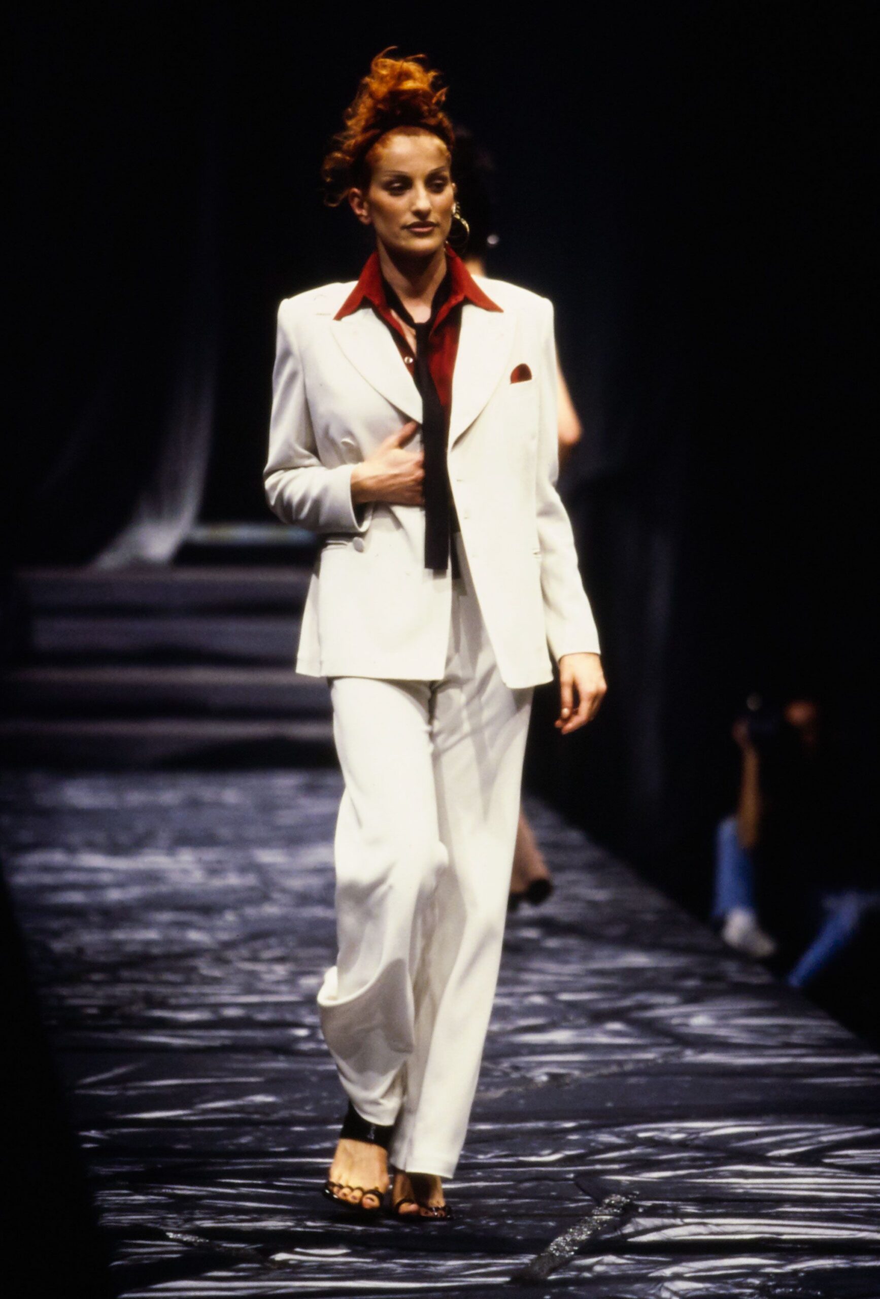 white tailored suit with red shirt