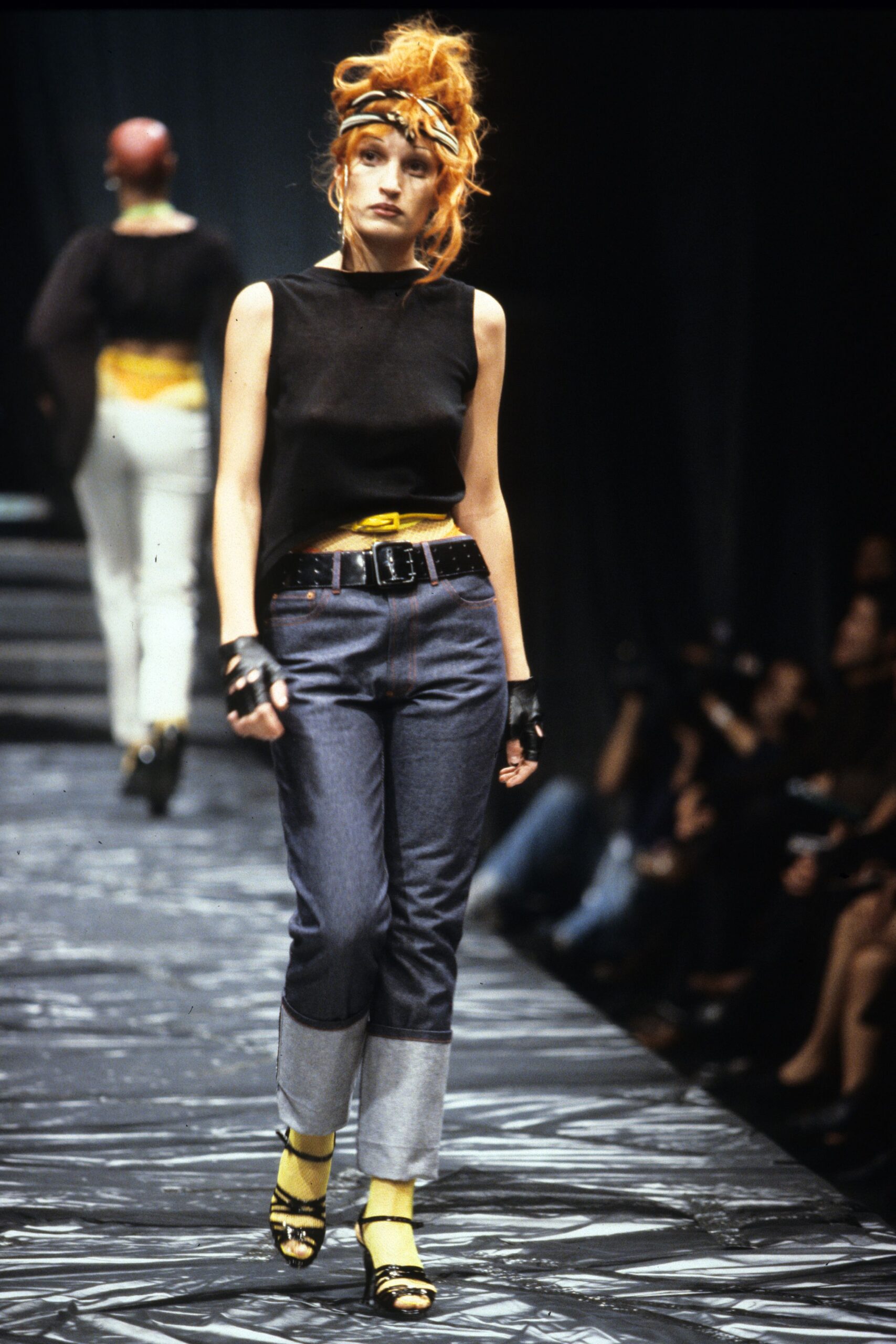 black sleeveless top with denim pants