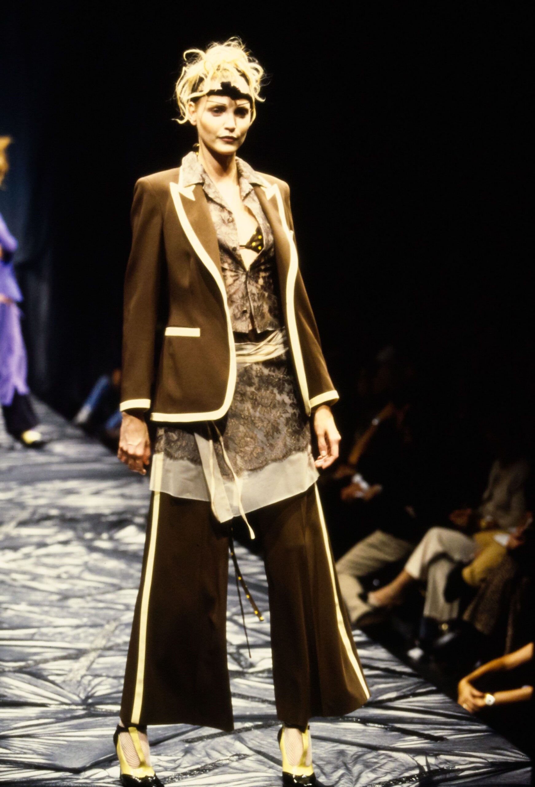 brown tailored suit with yellow shoes