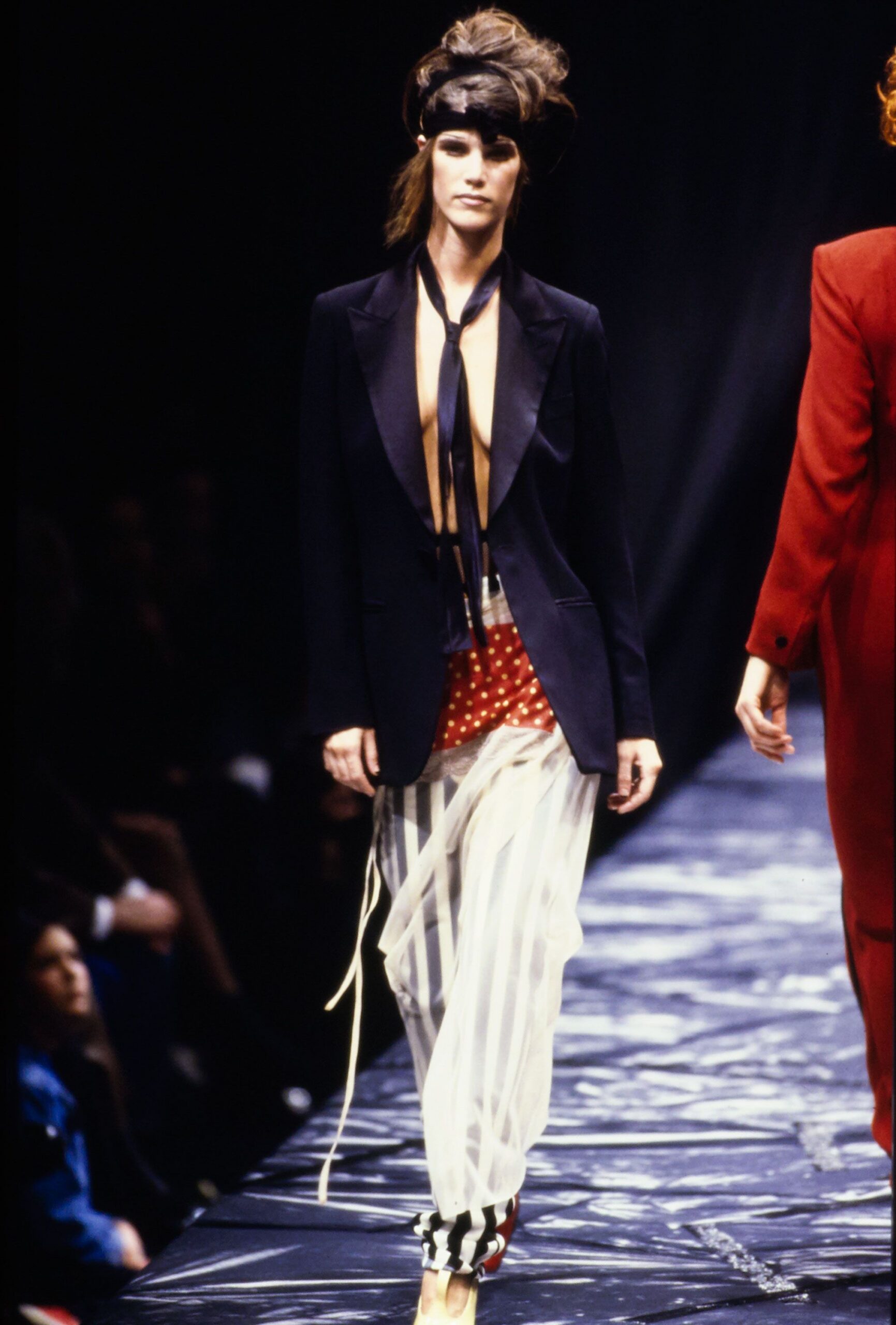 black tailored blazer with striped pants