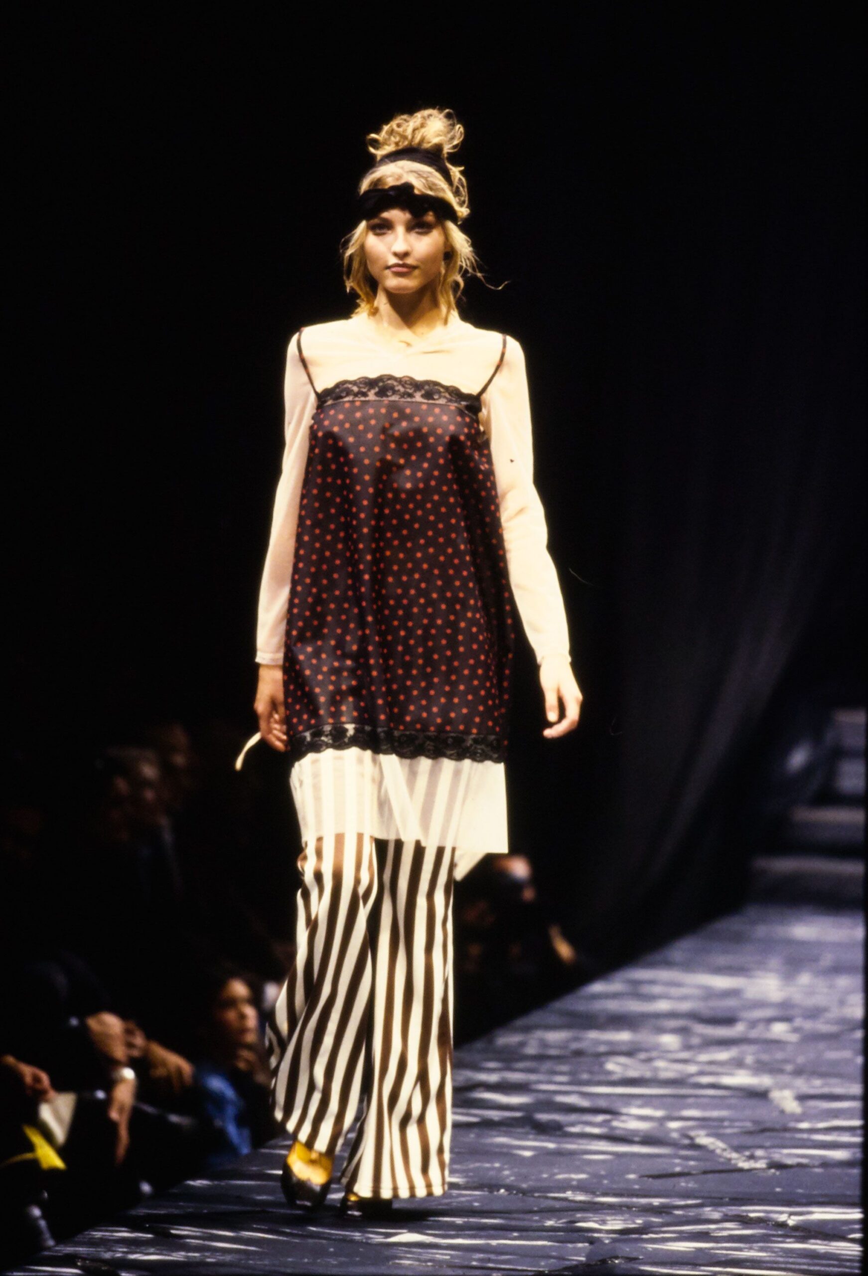 layered polka-dot dress with striped pants