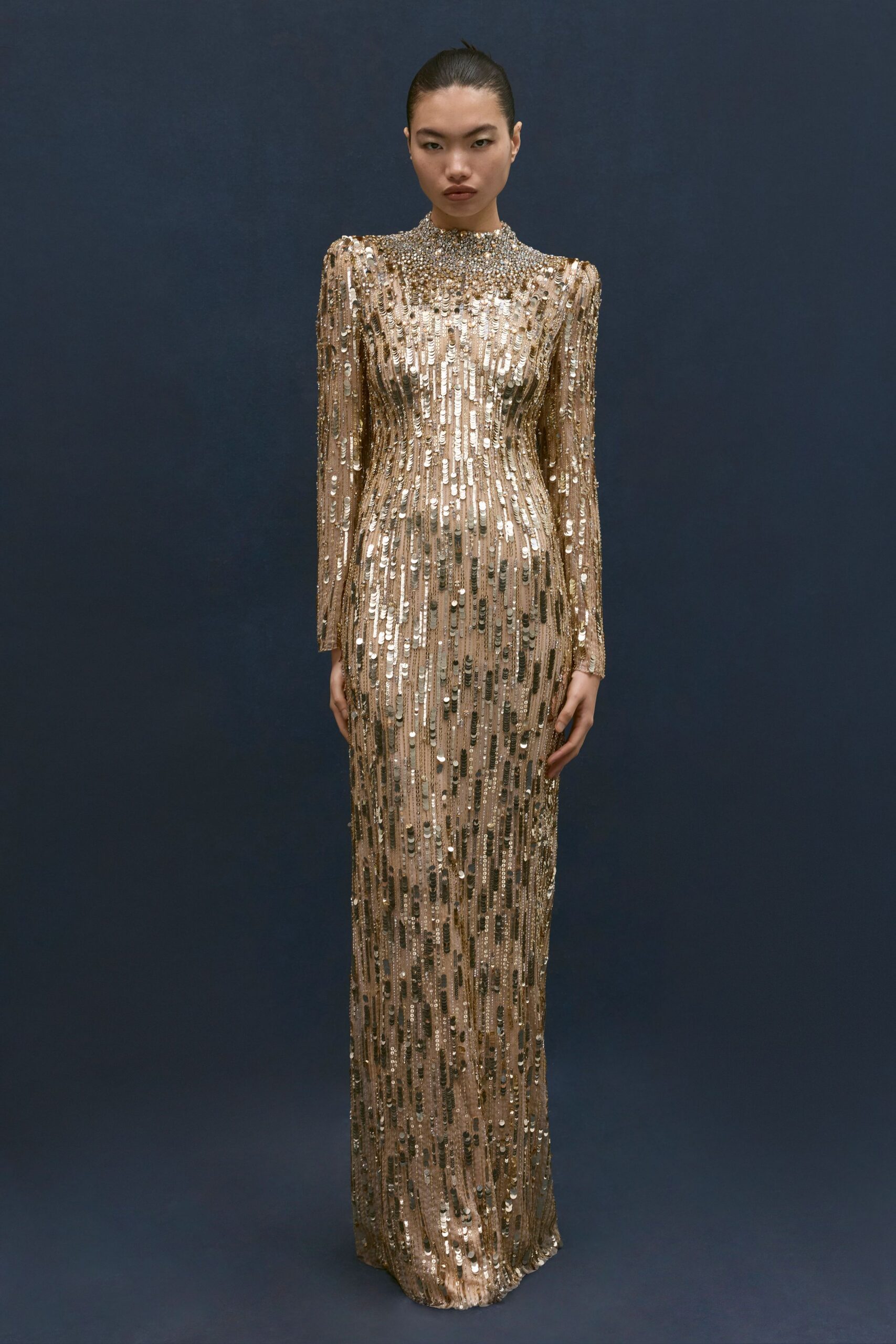 gold sequin long-sleeve gown