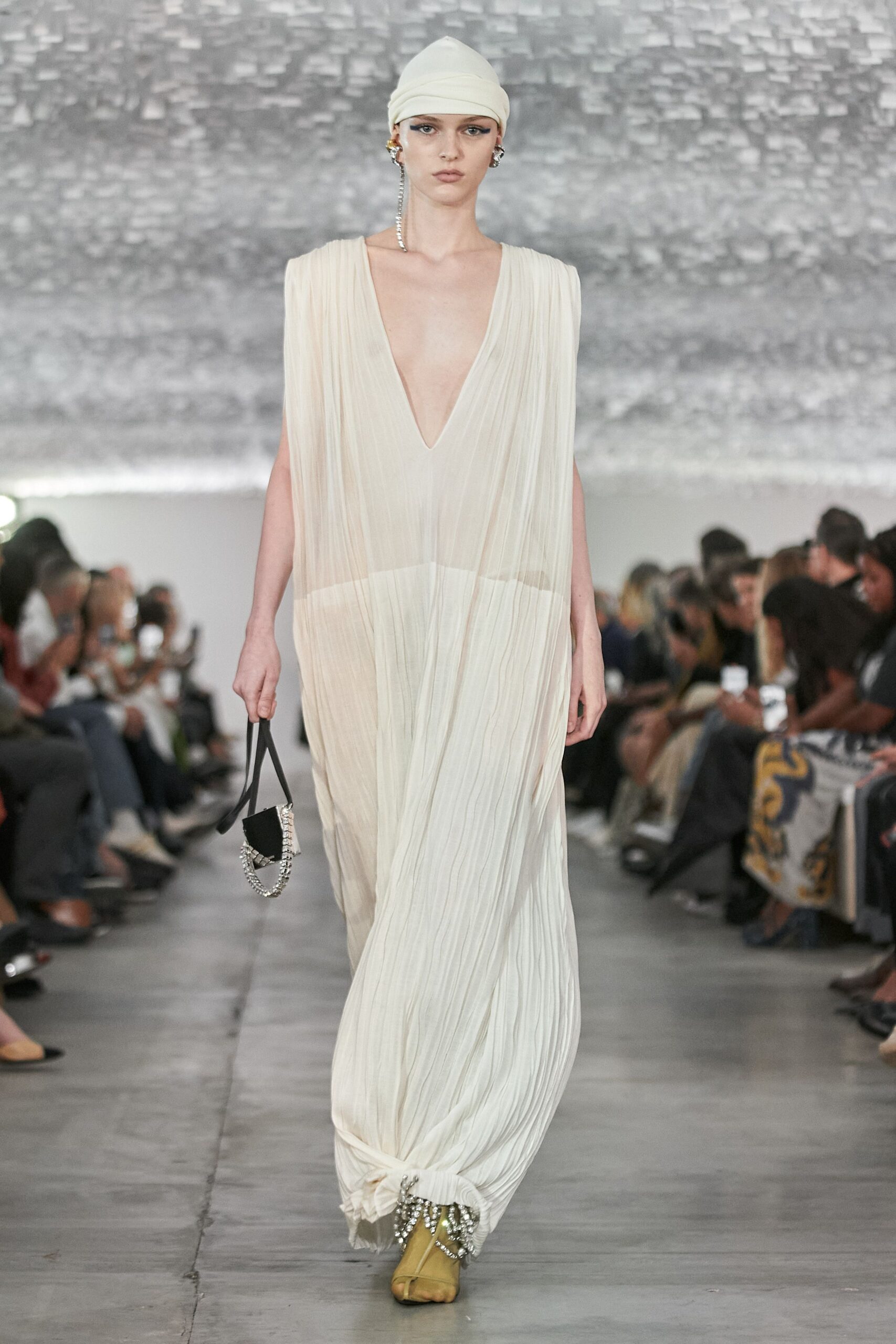 white silk sleeveless v-neck relaxed pleated flowing gown