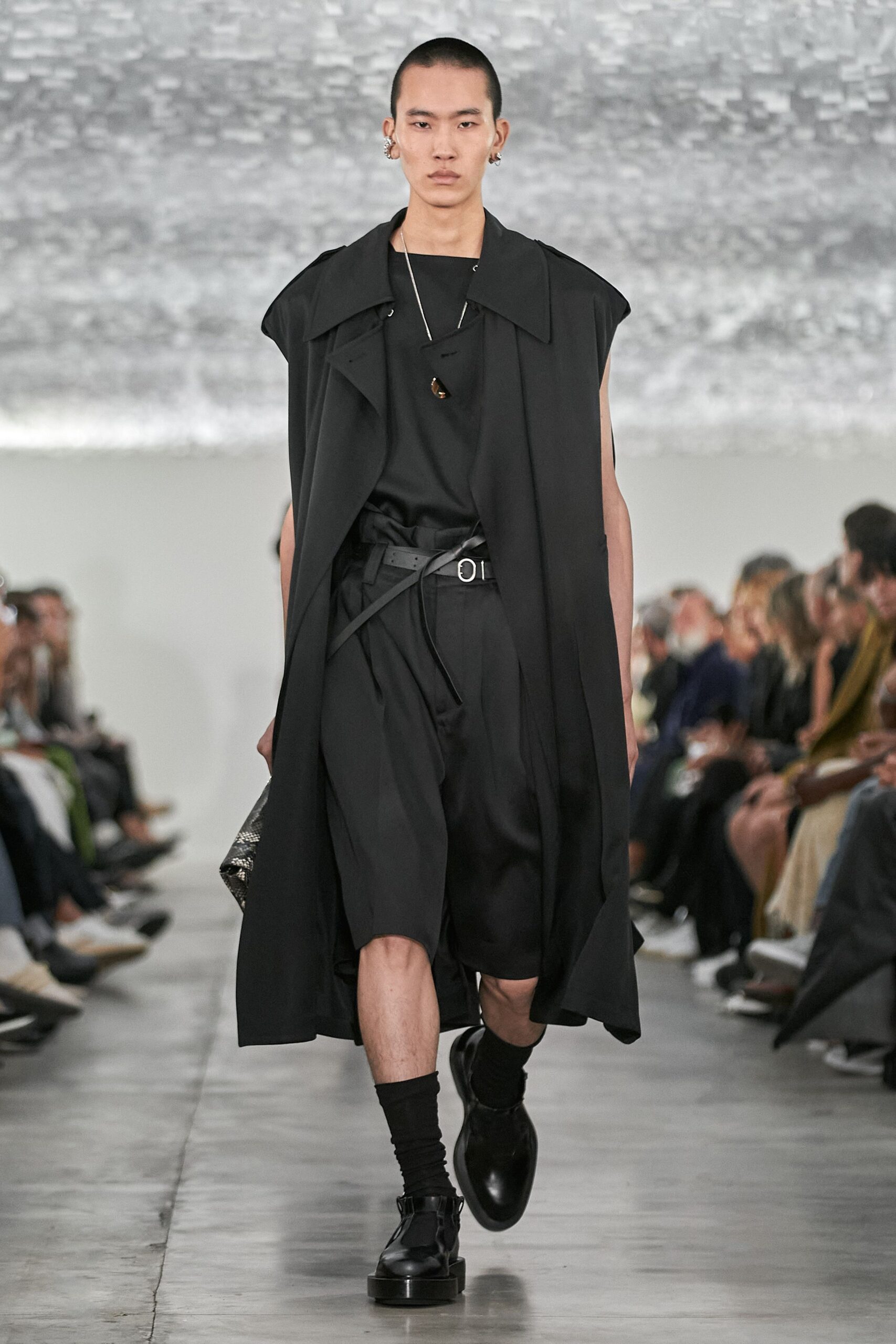 black coat and shorts ensemble
