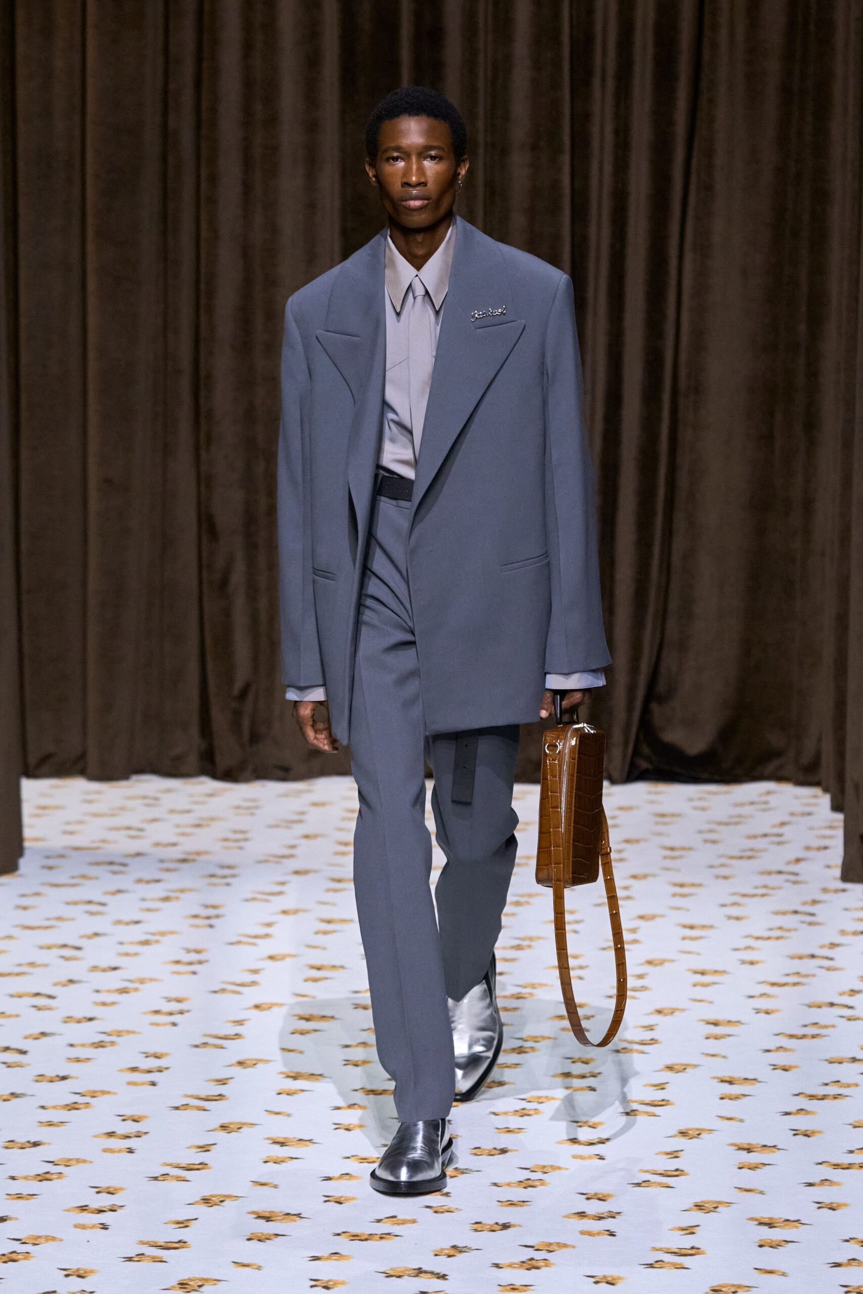 gray tailored suit with beige shirt