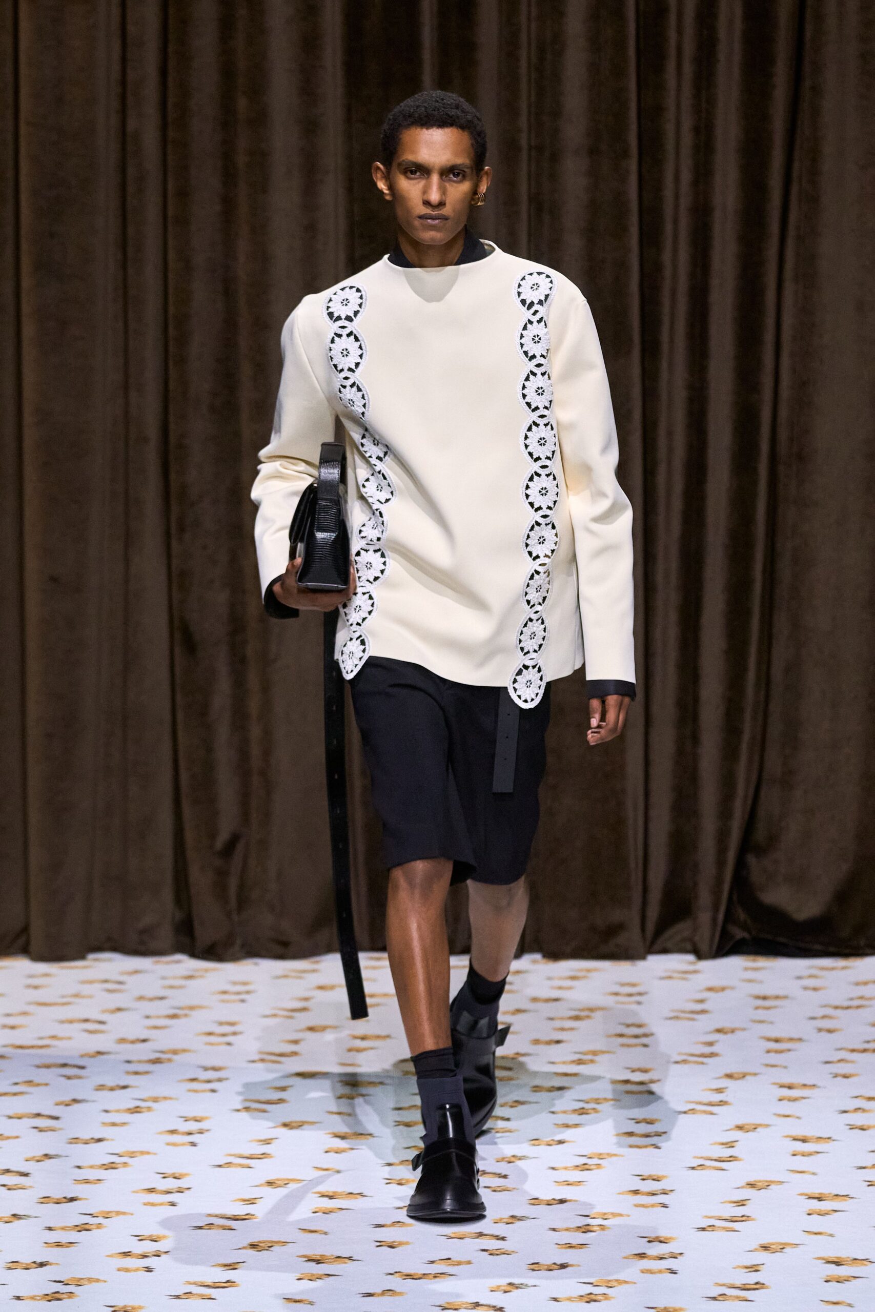 white fitted top with embroidered detail