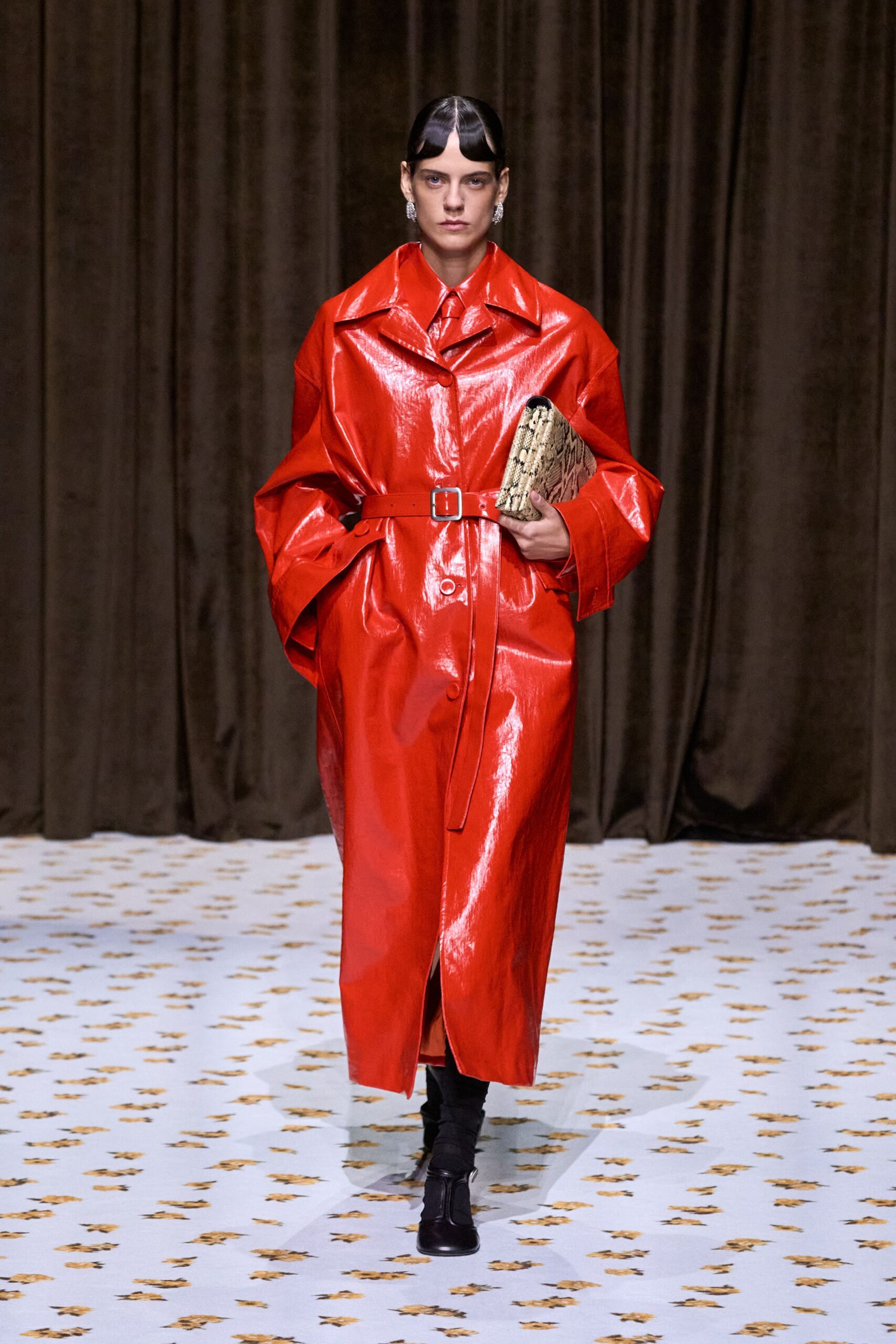 red vinyl long-sleeve collared oversized belted shiny coat