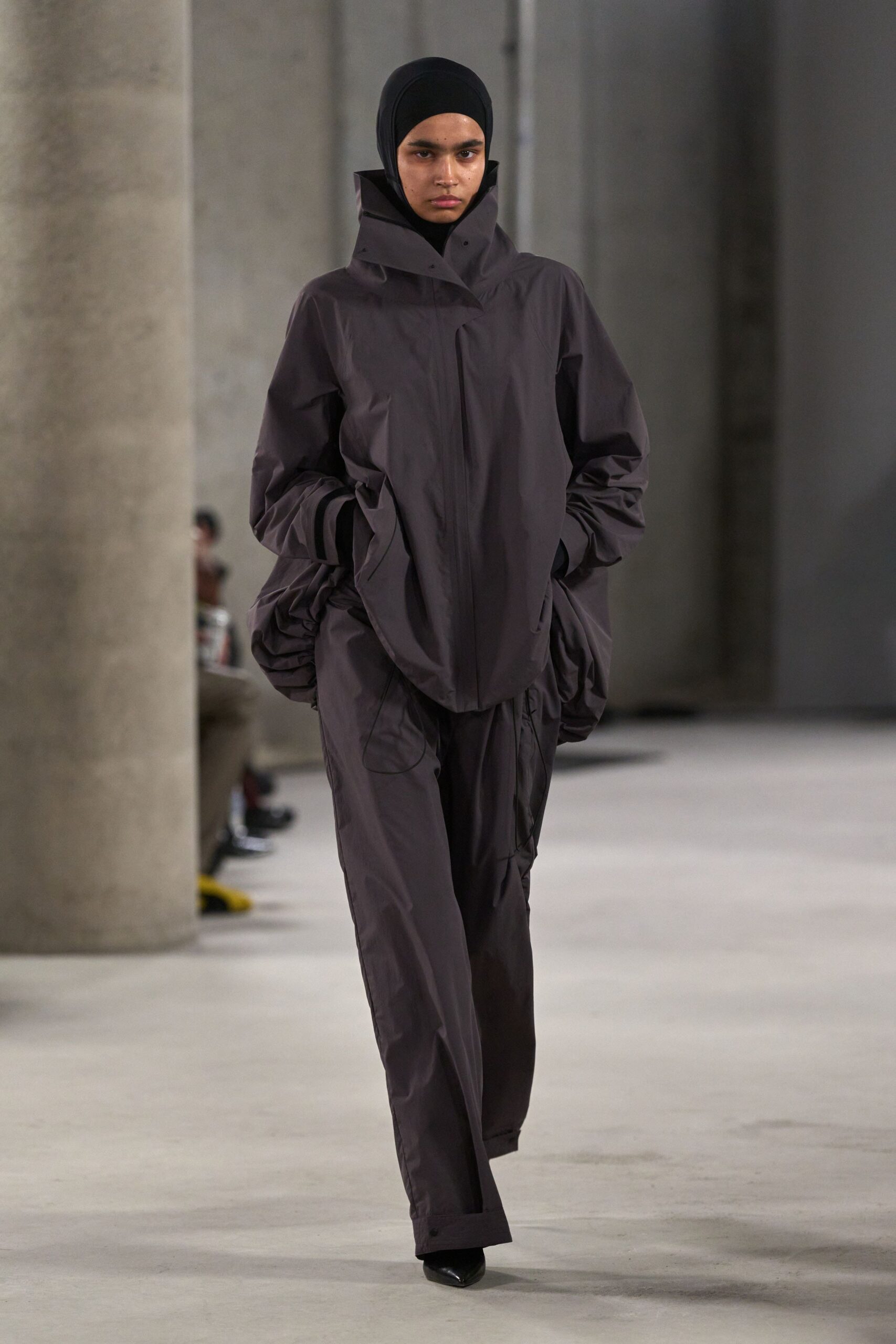 black vinyl long-sleeve hooded relaxed zippered jacket