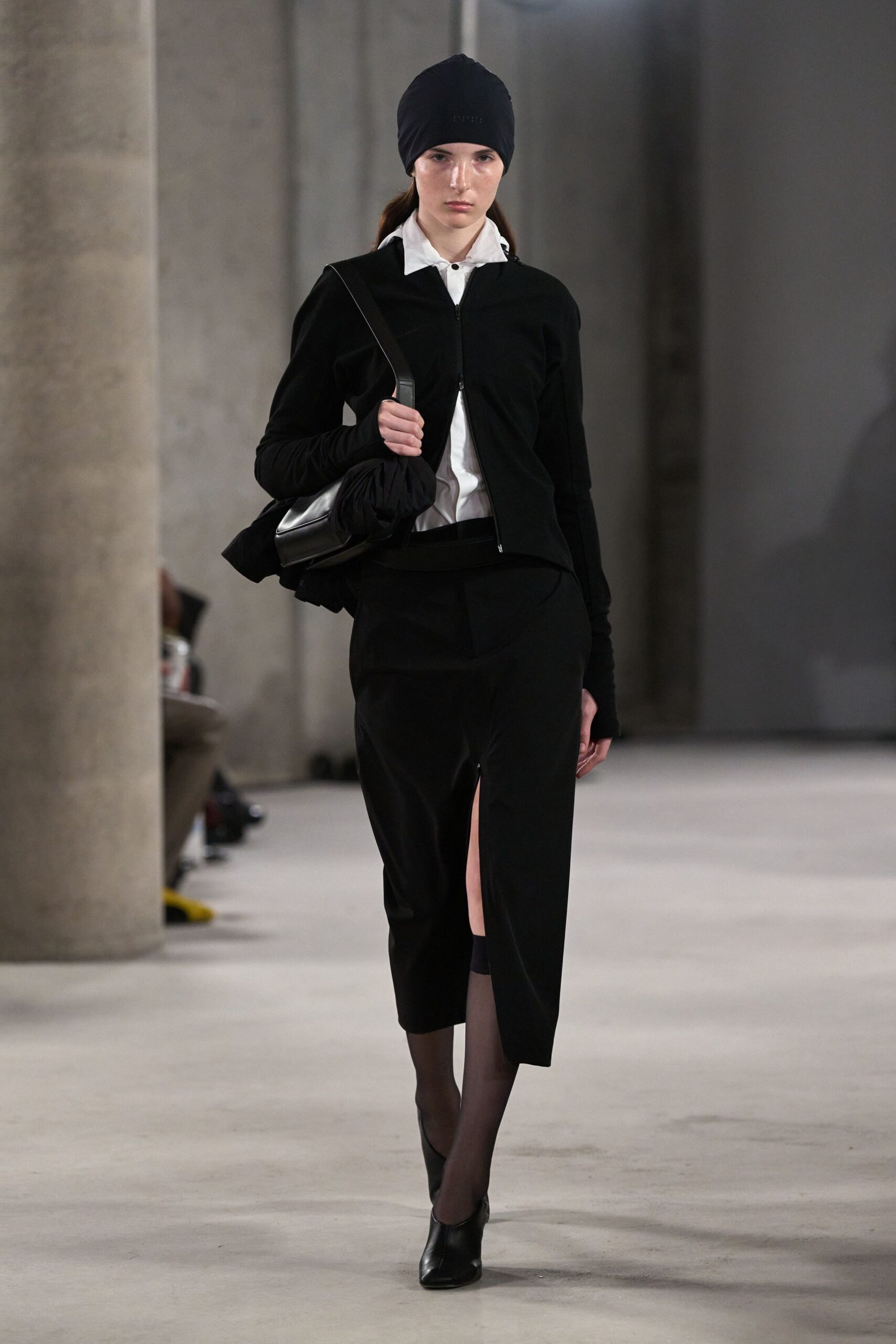 black fitted blazer and midi skirt
