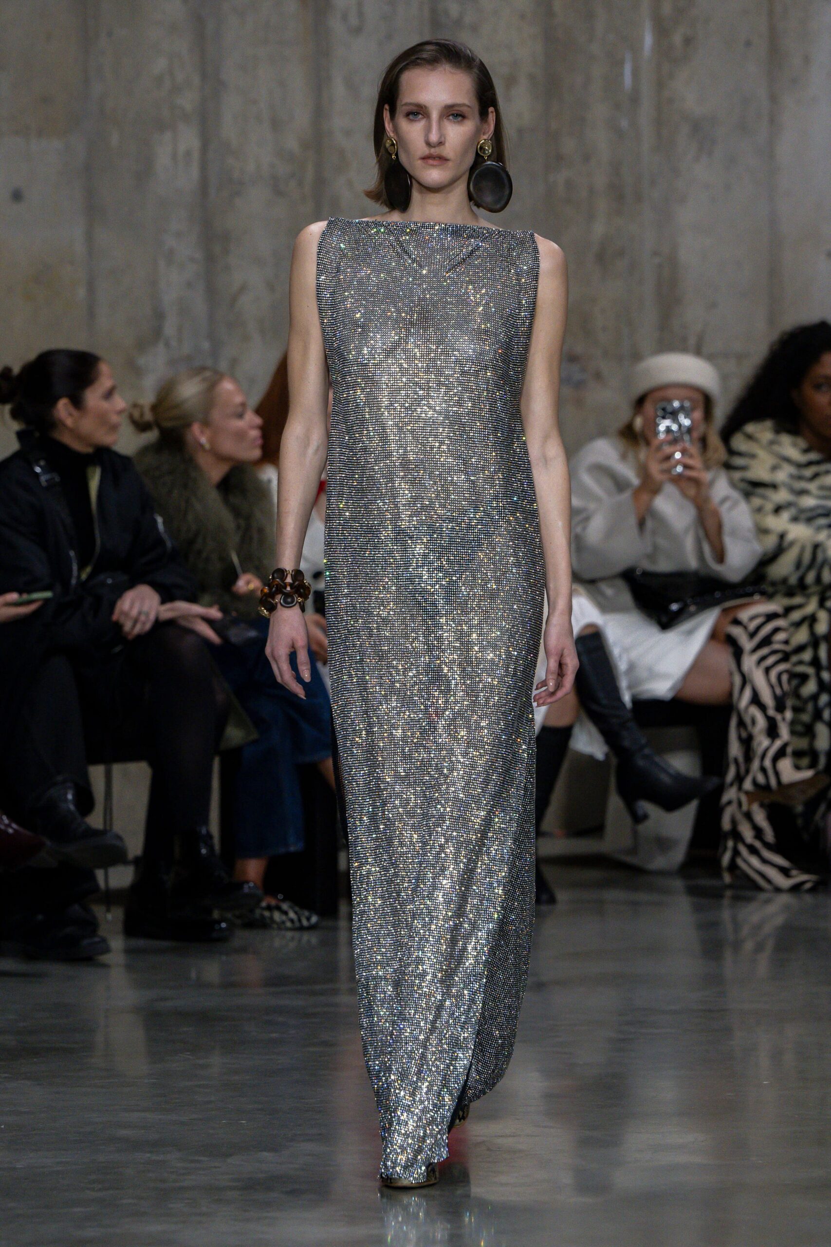 shiny silver sleeveless gown