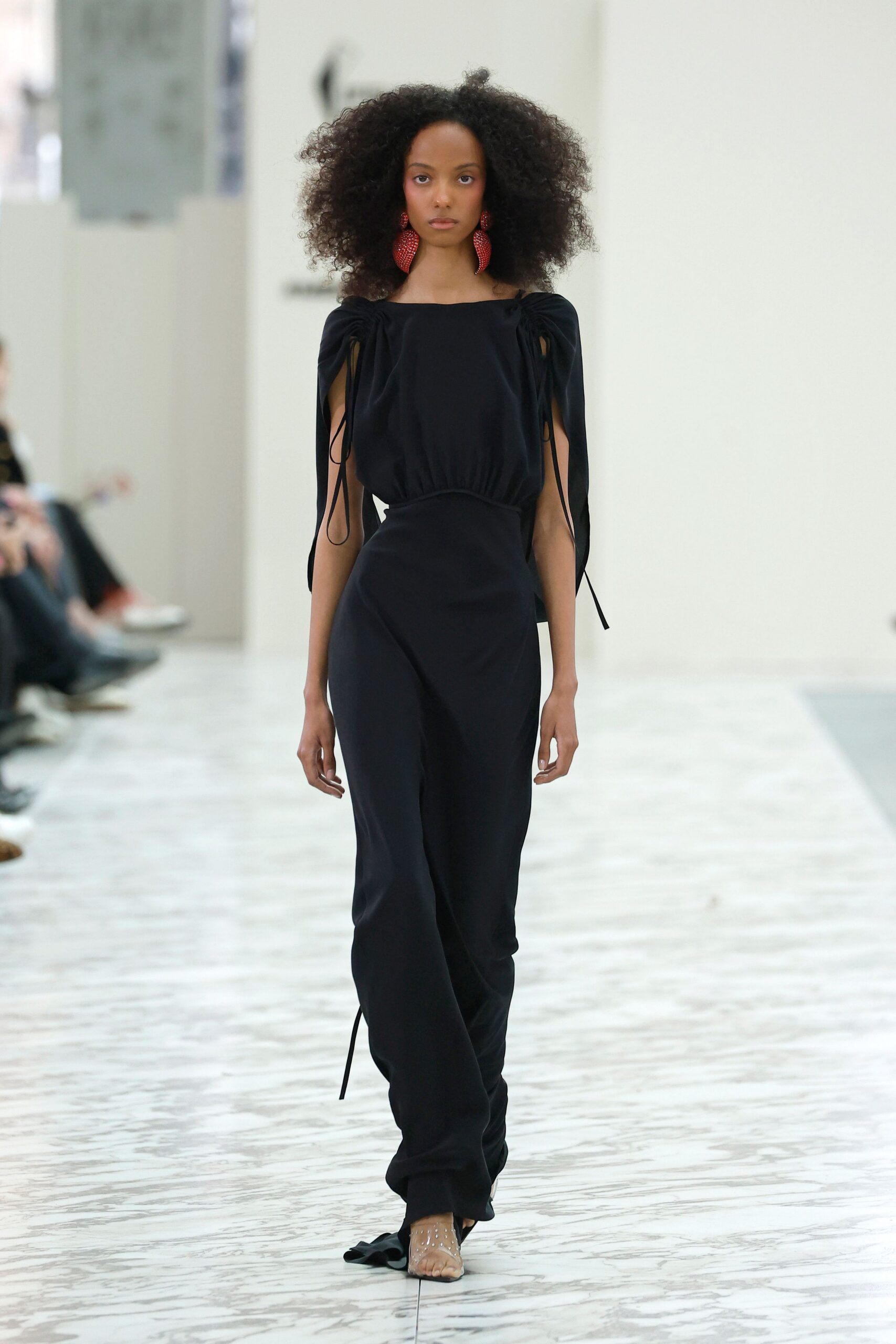 black cotton sleeveless high-neck fitted draped jumpsuit