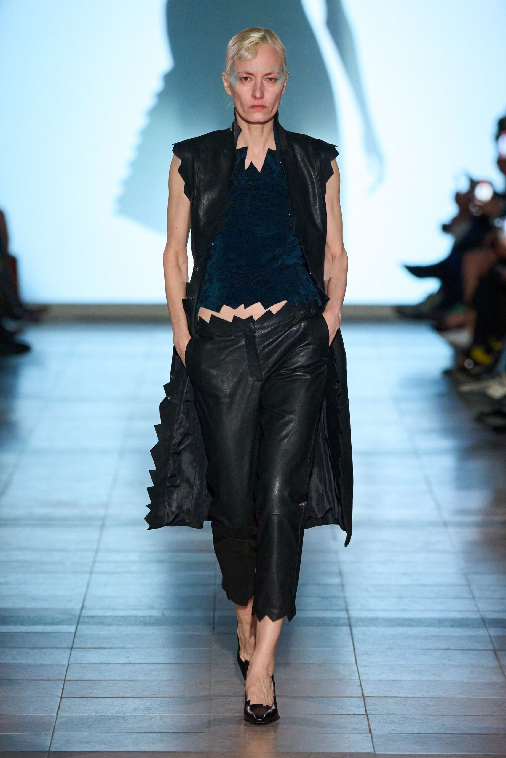 black leather long-sleeve asymmetric relaxed coat