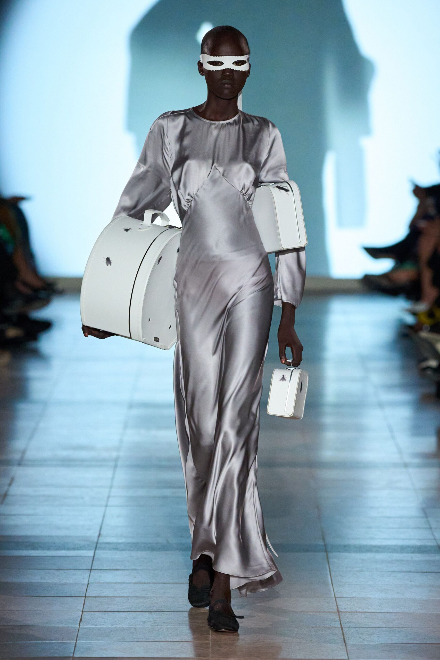 gray silk long-sleeve v-neck fitted draped shiny gown