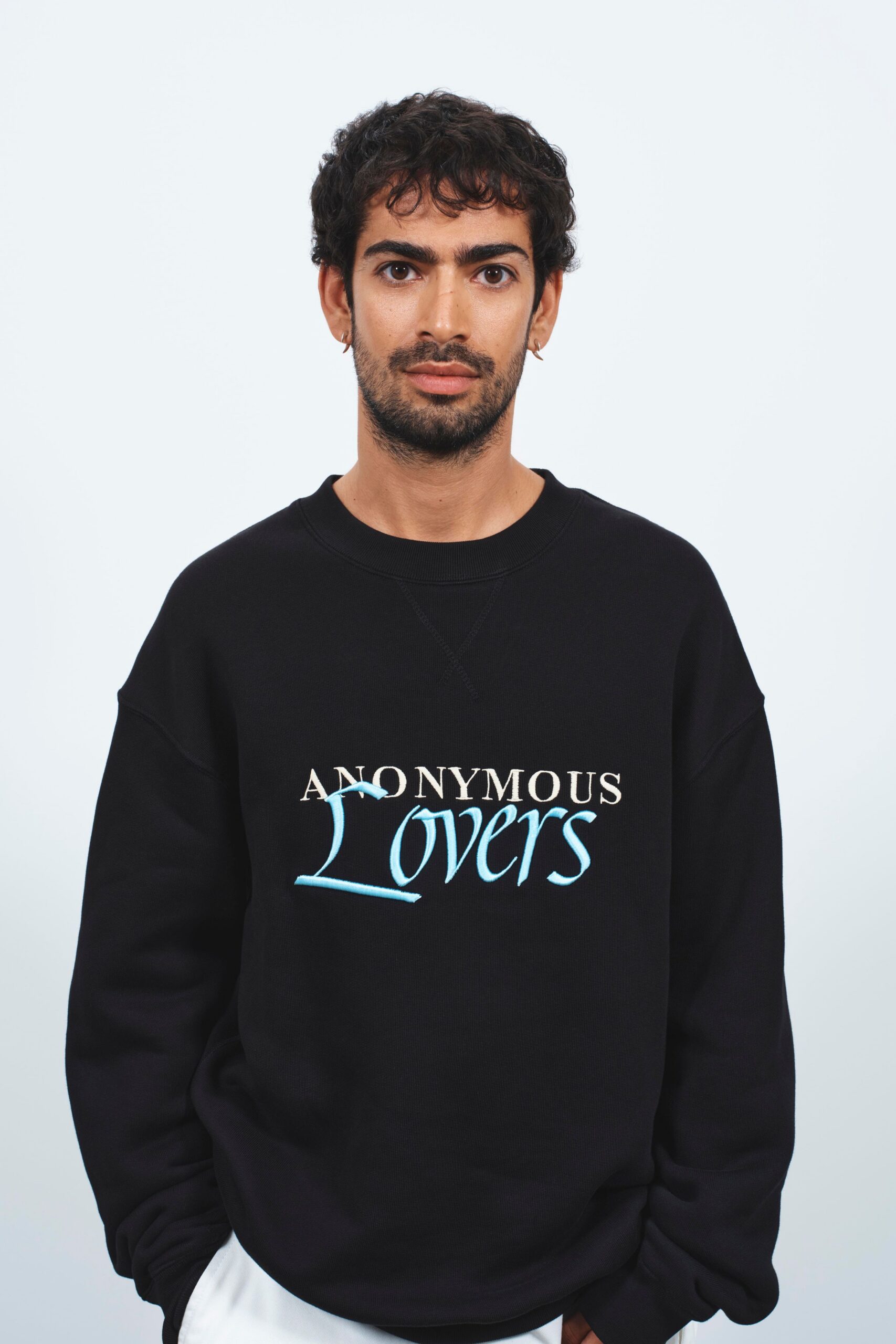 black relaxed sweater with print