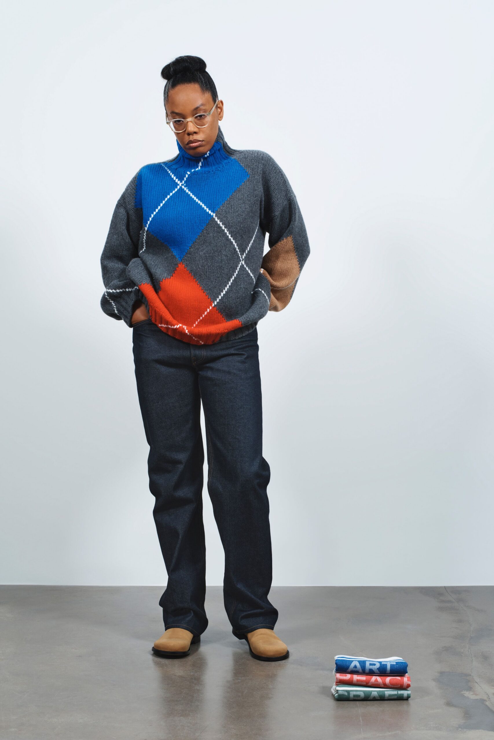 oversized color-blocked sweater with relaxed jeans
