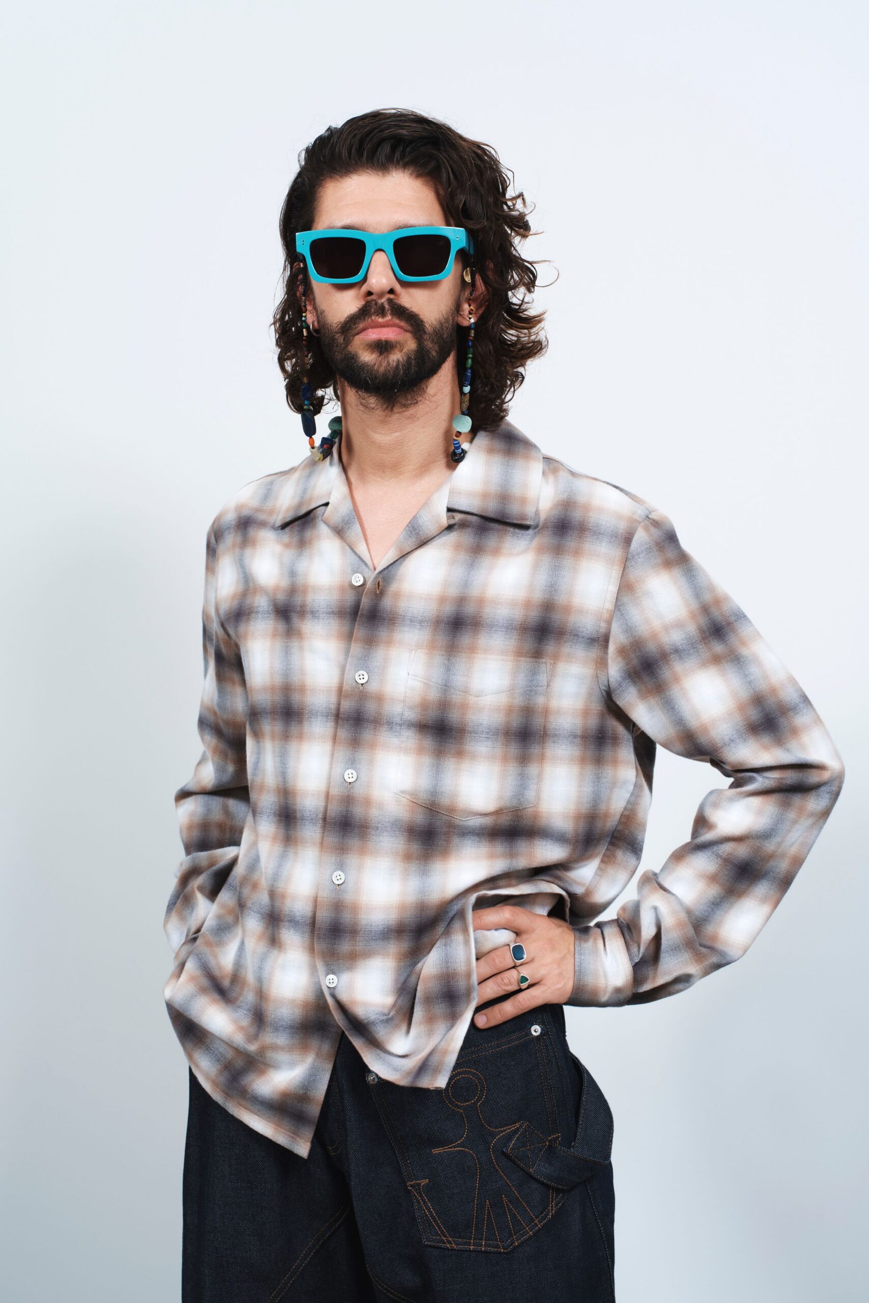checked shirt with denim pants