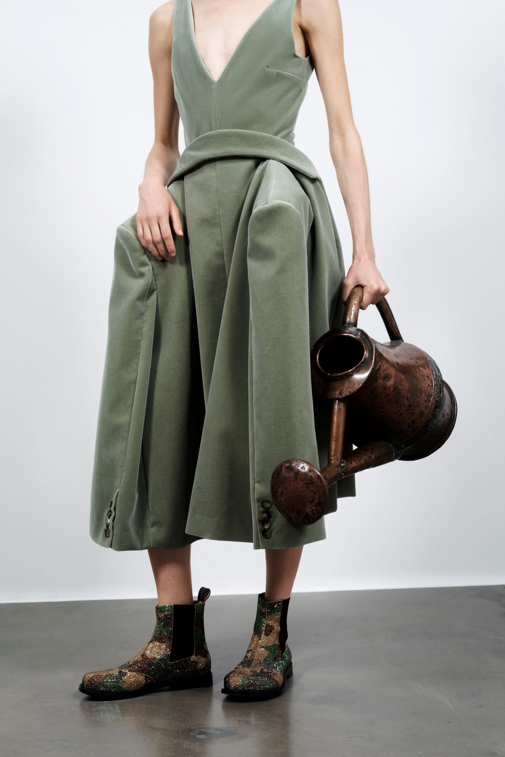 green cotton sleeveless v-neck fitted pleated midi dress