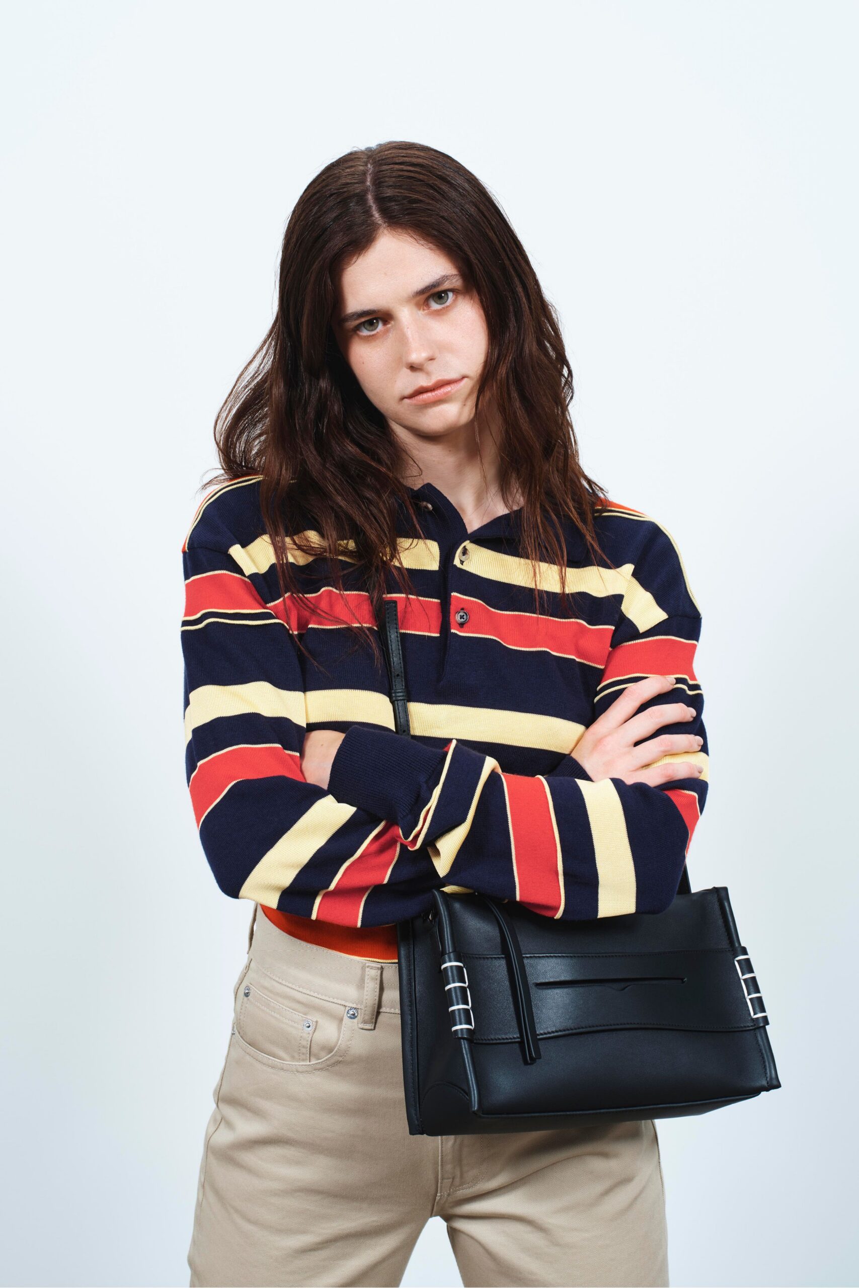 striped shirt with beige pants