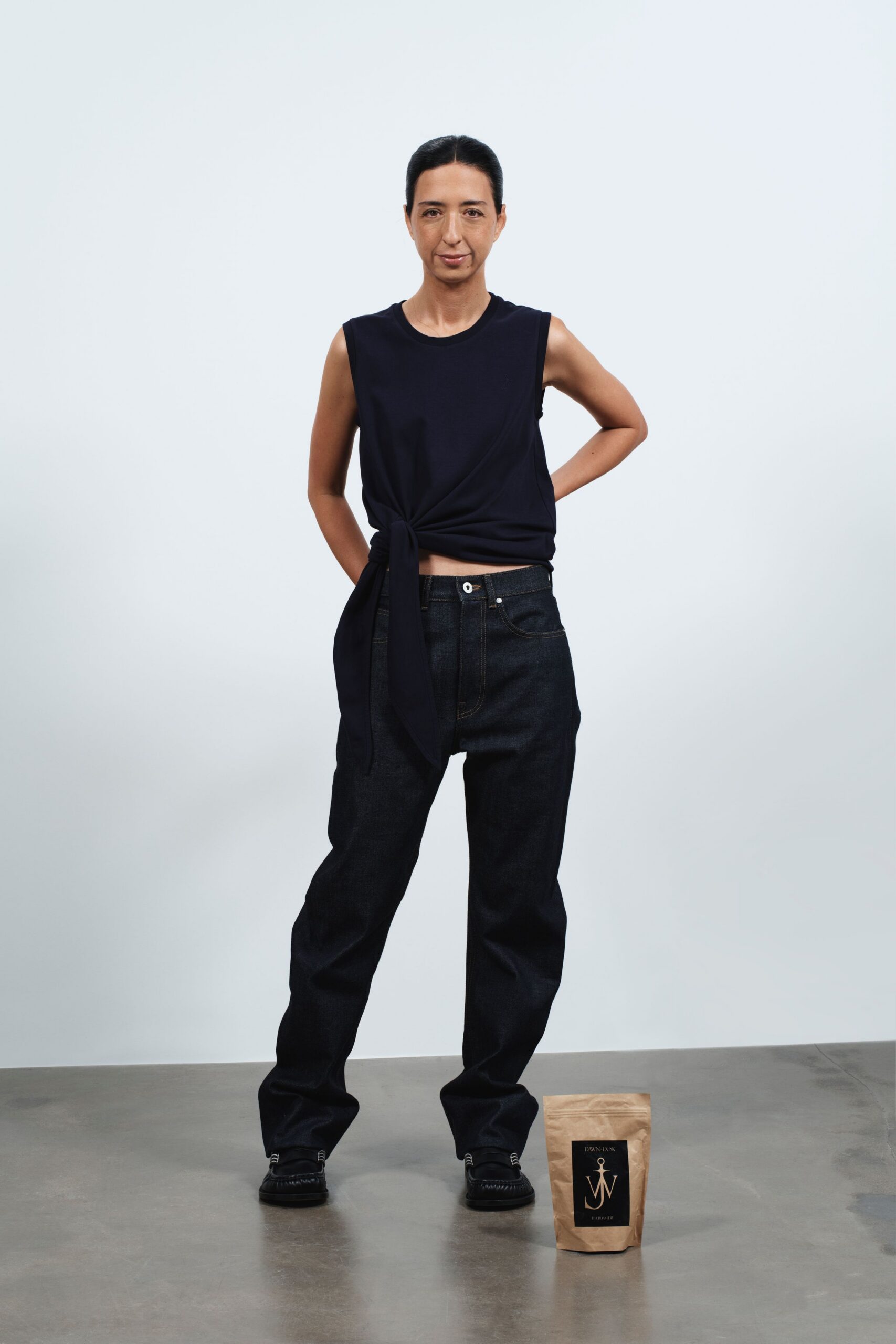 black relaxed top with denim pants