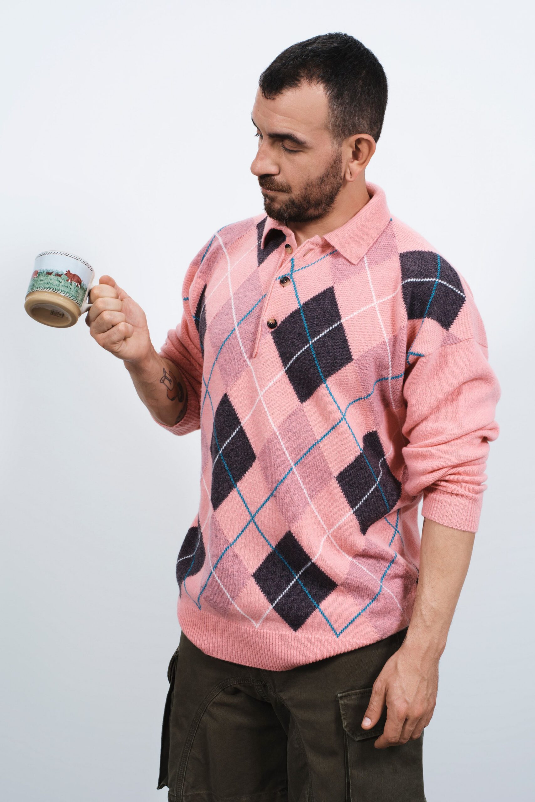 pink cotton long-sleeve collared relaxed sweater