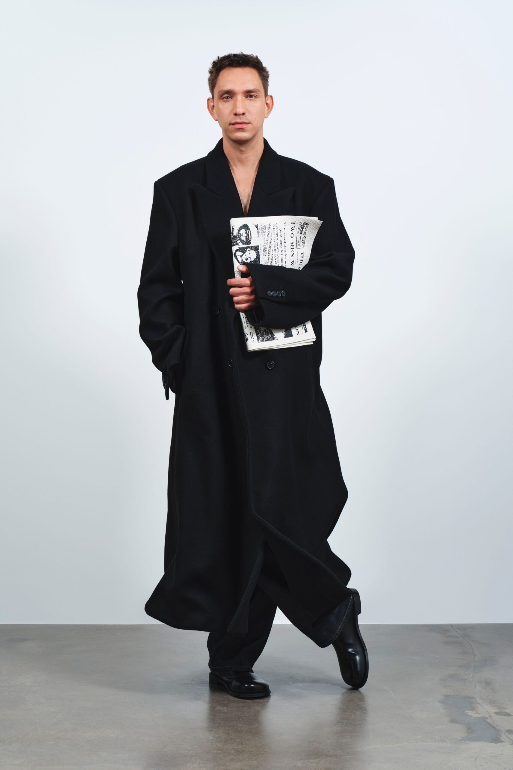 black wool long-sleeve collared oversized buttoned maxi coat