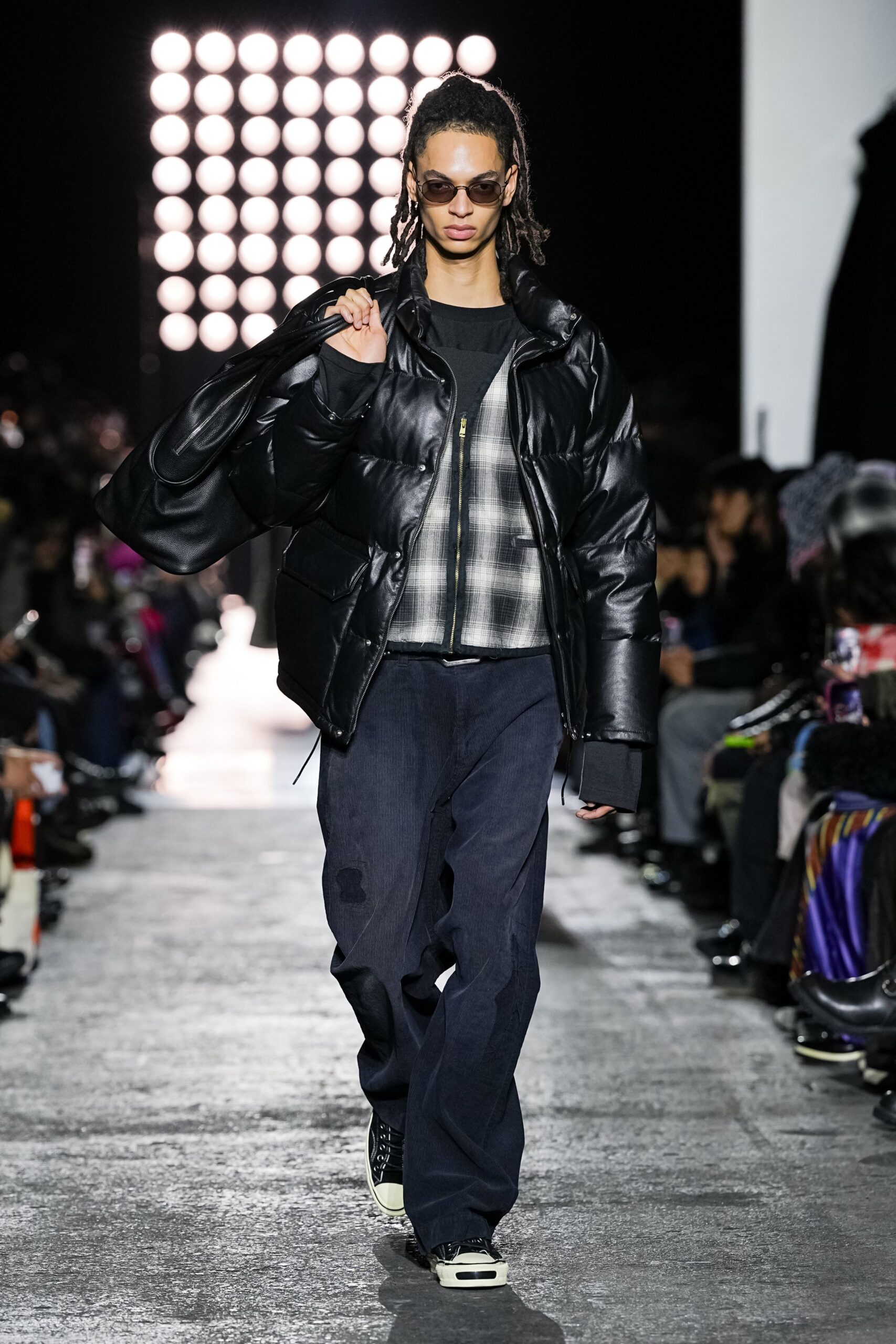 black puffer jacket with checked shirt