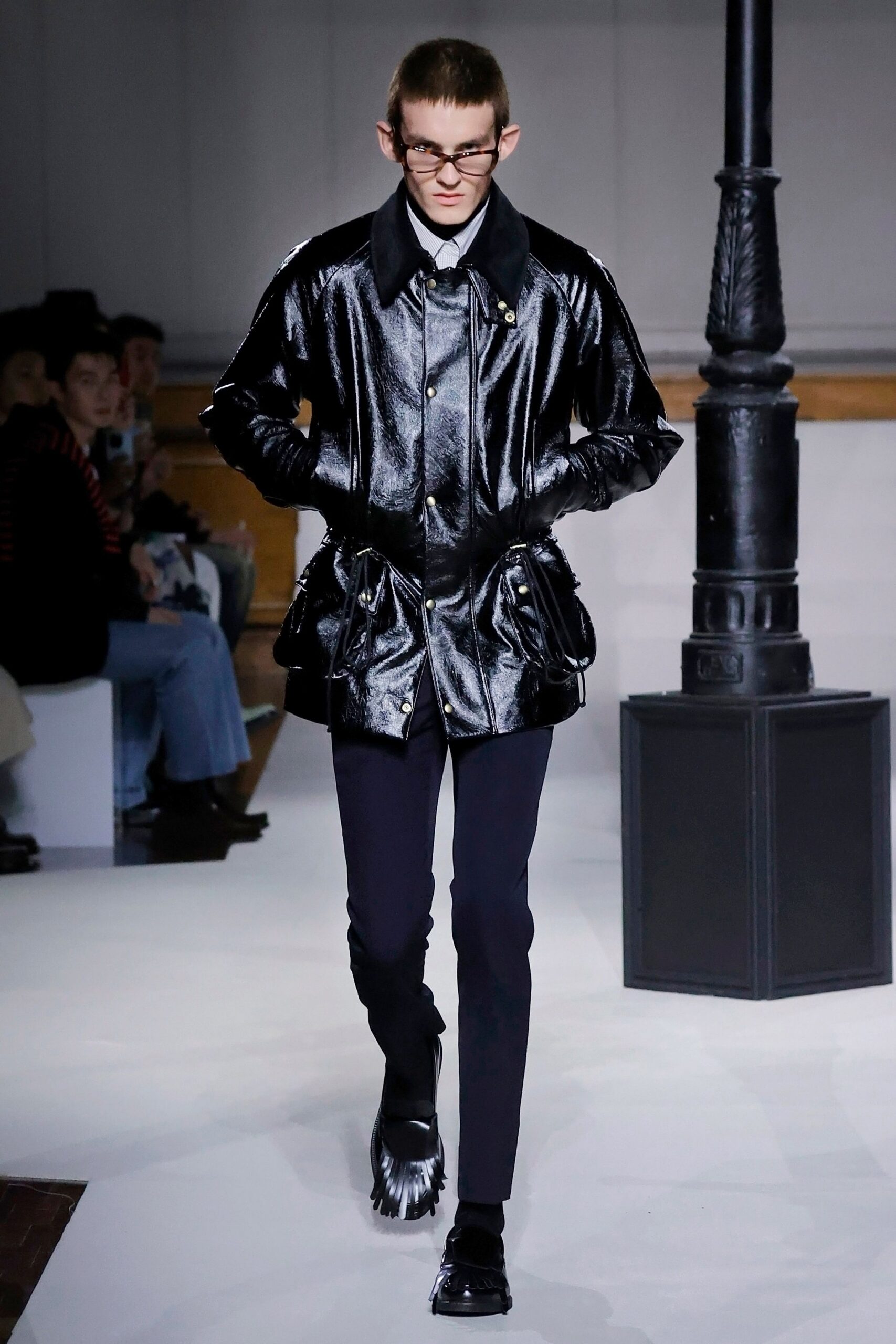black leather long-sleeve collared fitted zippered pockets jacket