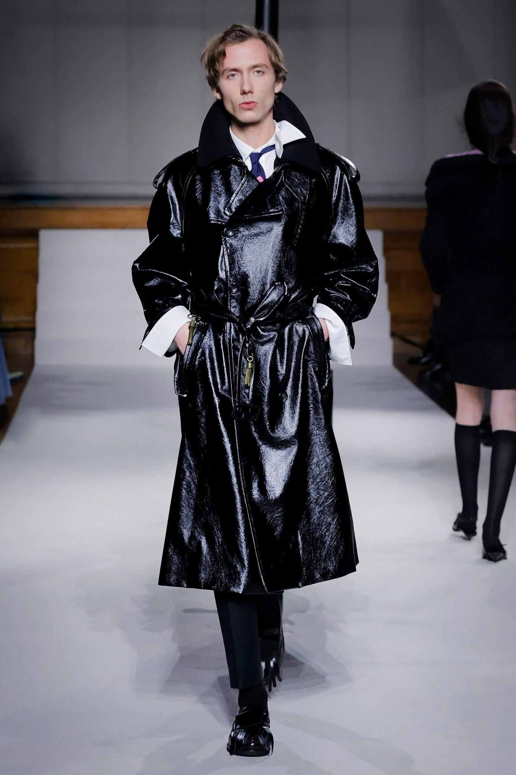 black vinyl long-sleeve collared relaxed zippered belted trench