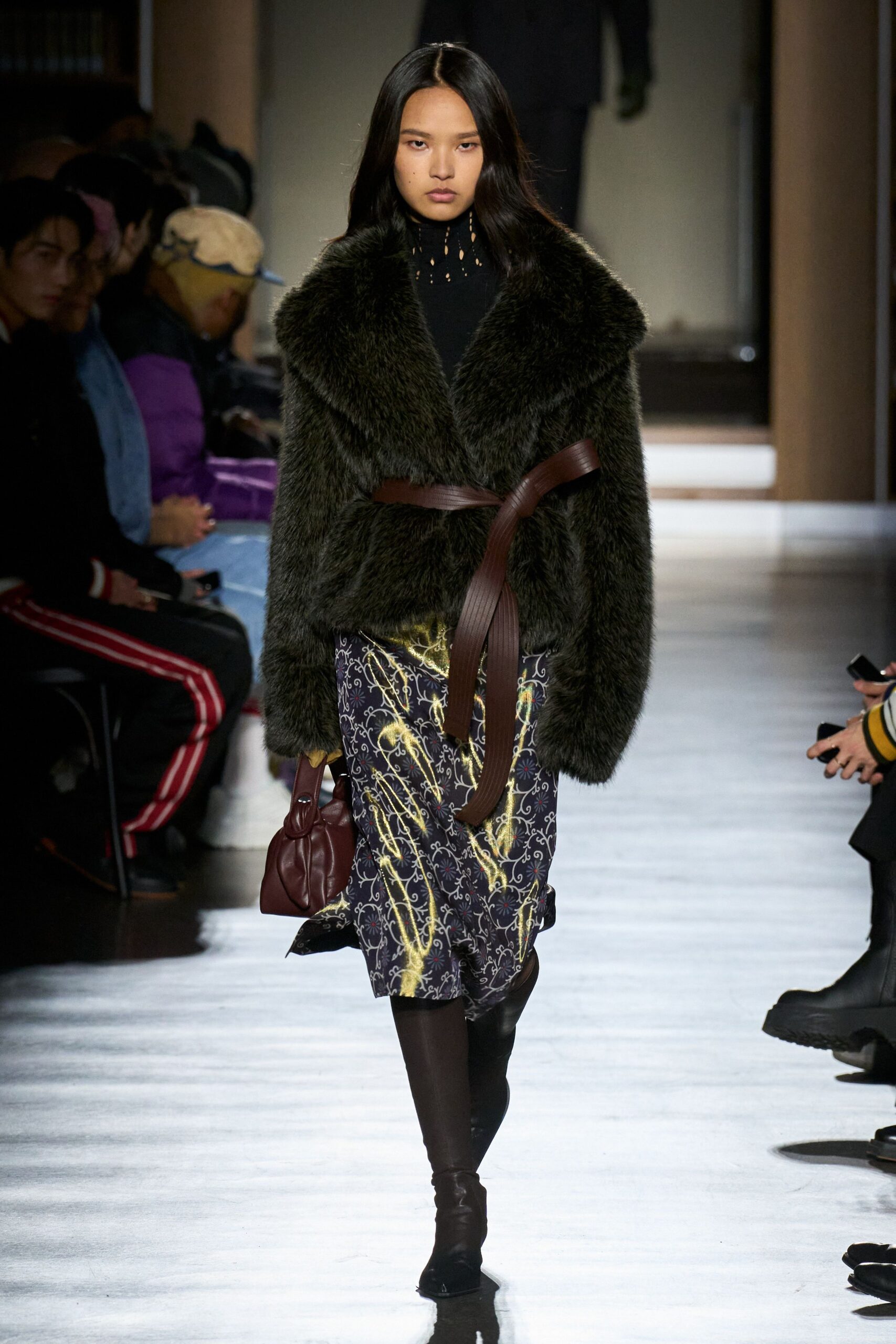 green fur coat with printed skirt