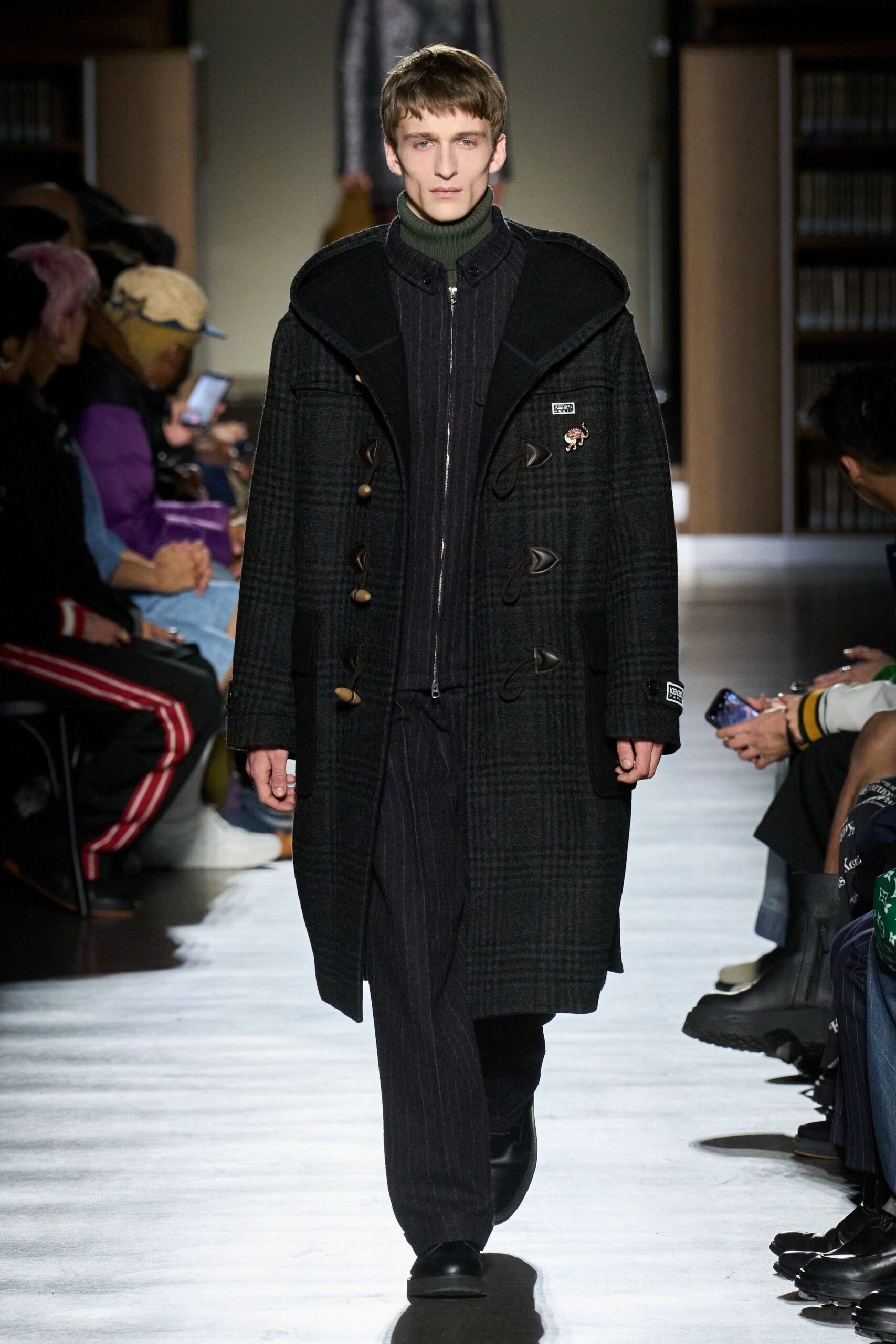 black wool long-sleeve collared relaxed buttoned pleated coat