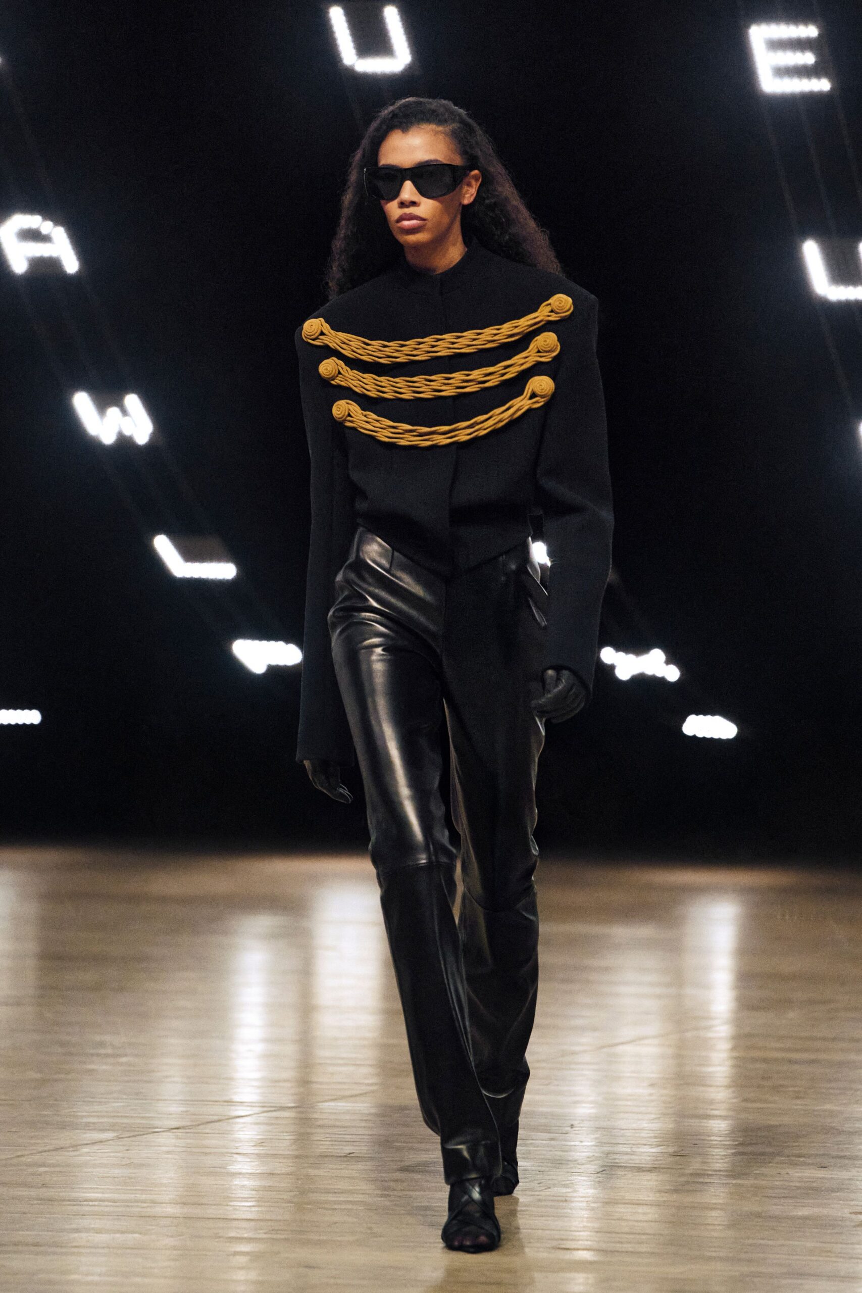 black structured jacket with leather pants