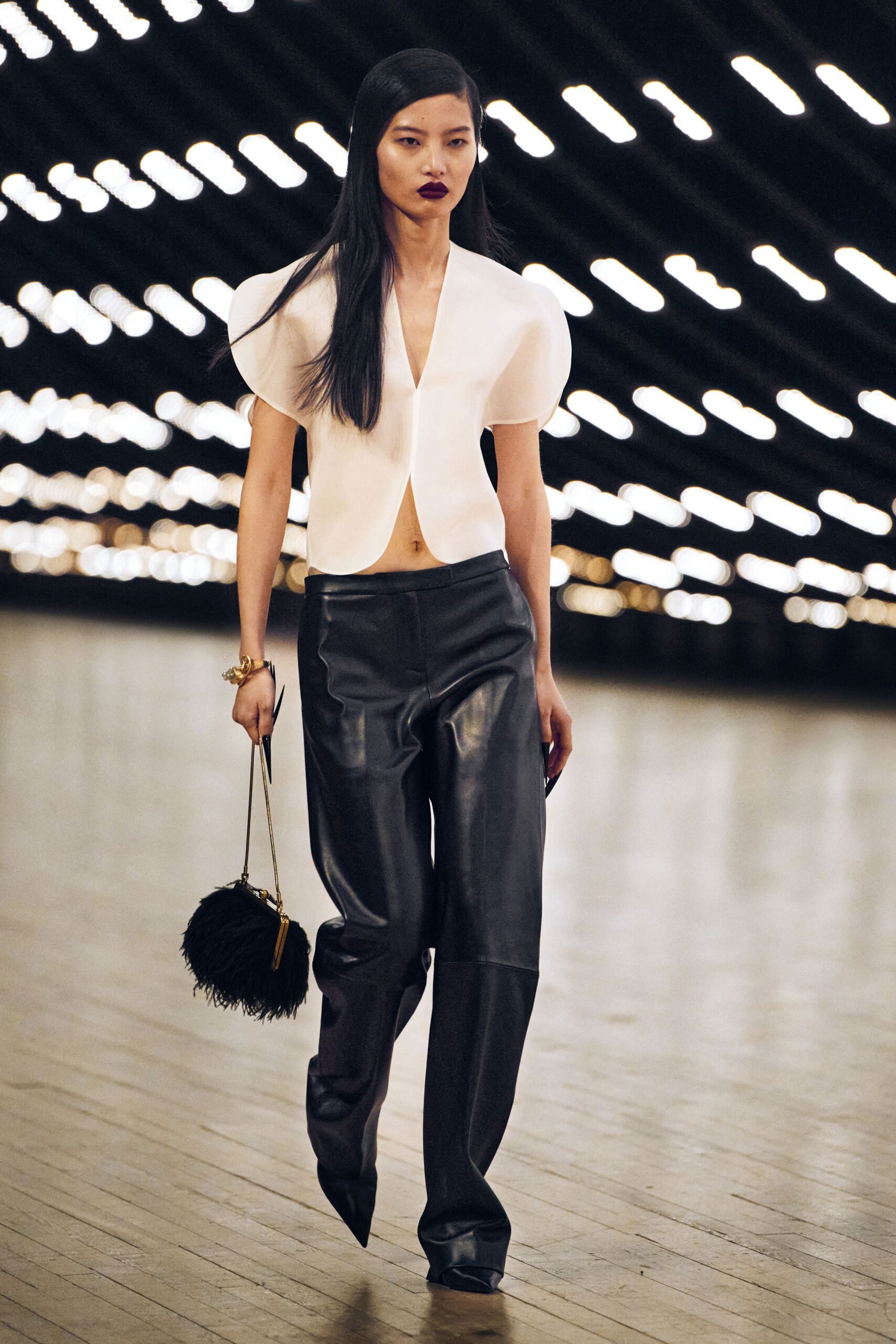 black fur fringed bag