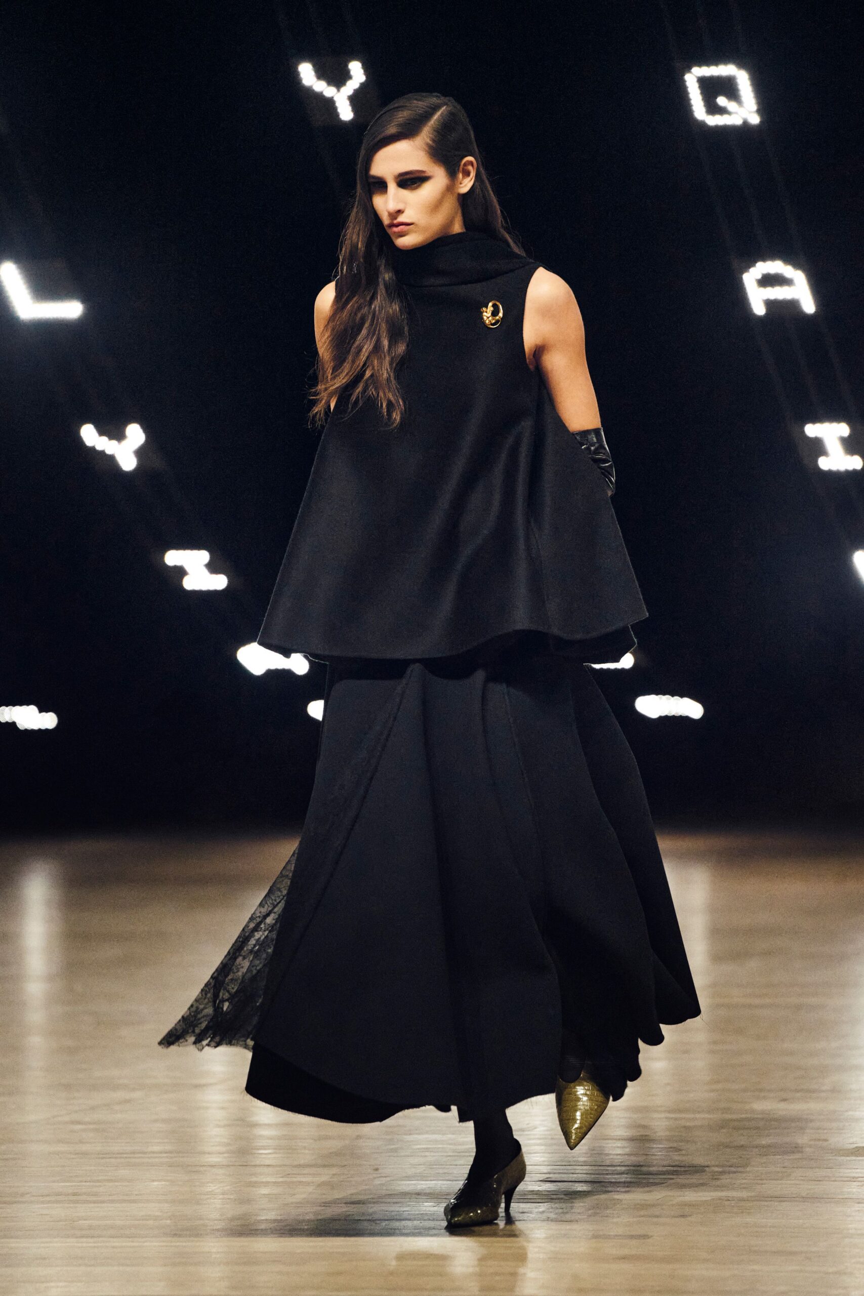 black wool sleeveless high-neck fitted layered a-line dress