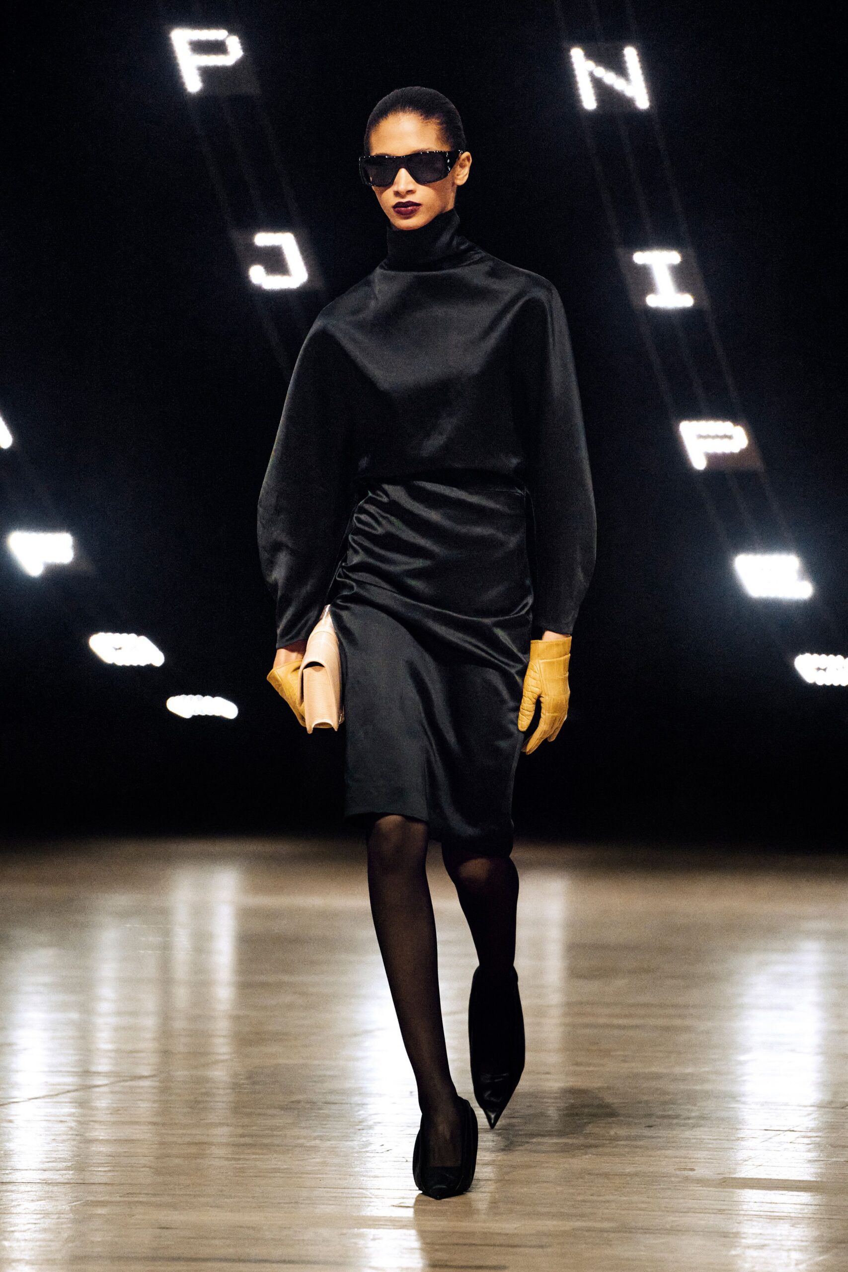 black fitted midi dress with gloves