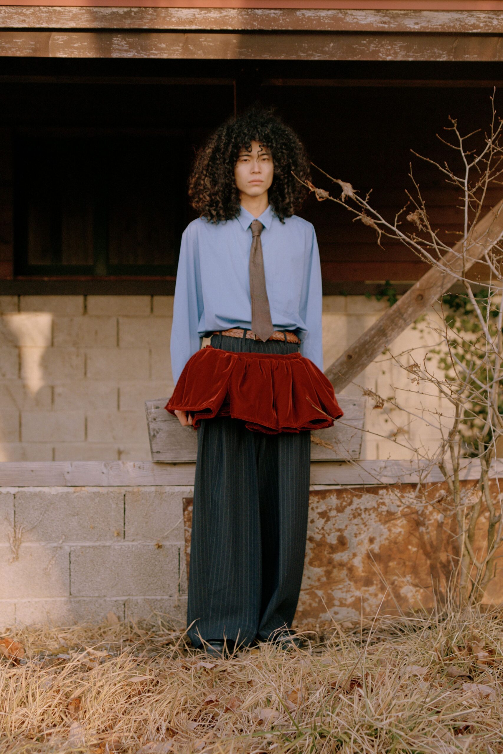 blue shirt black pants red skirt