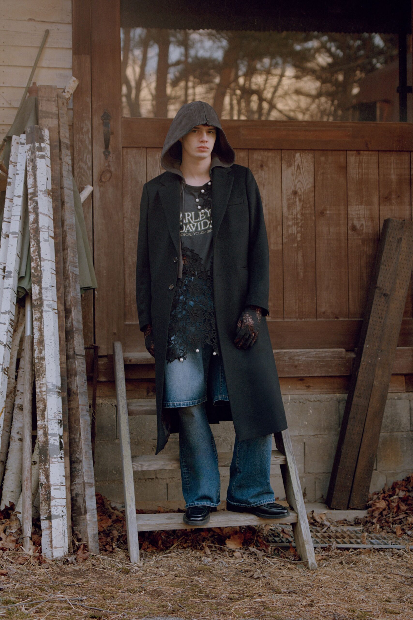 black wool coat with denim pants