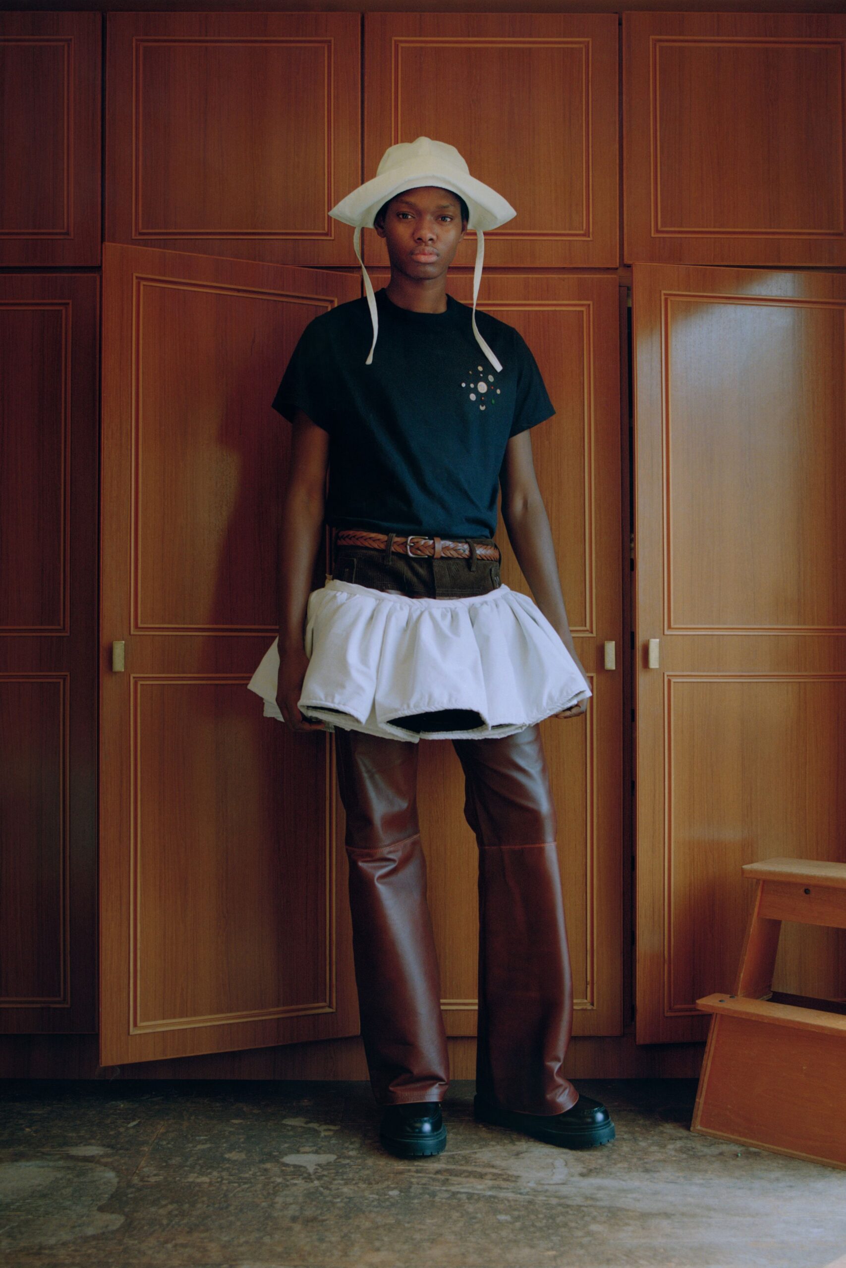 black t-shirt white tiered skirt