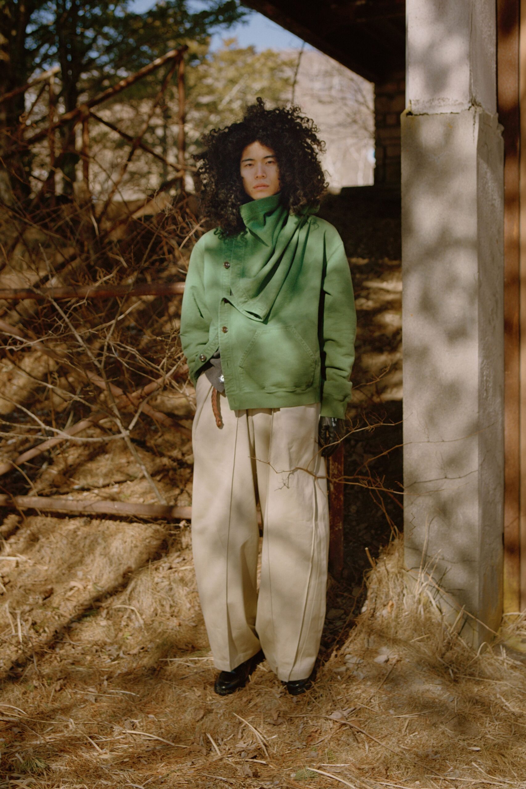 green relaxed jacket beige wide-leg pants