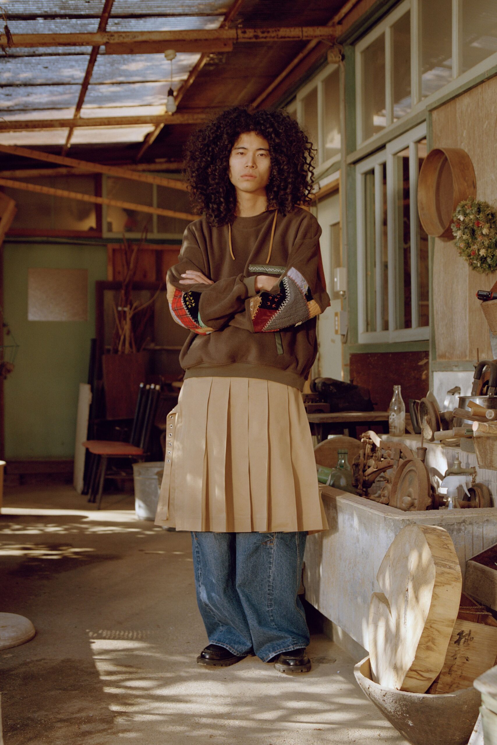 brown relaxed sweater beige pleated skirt